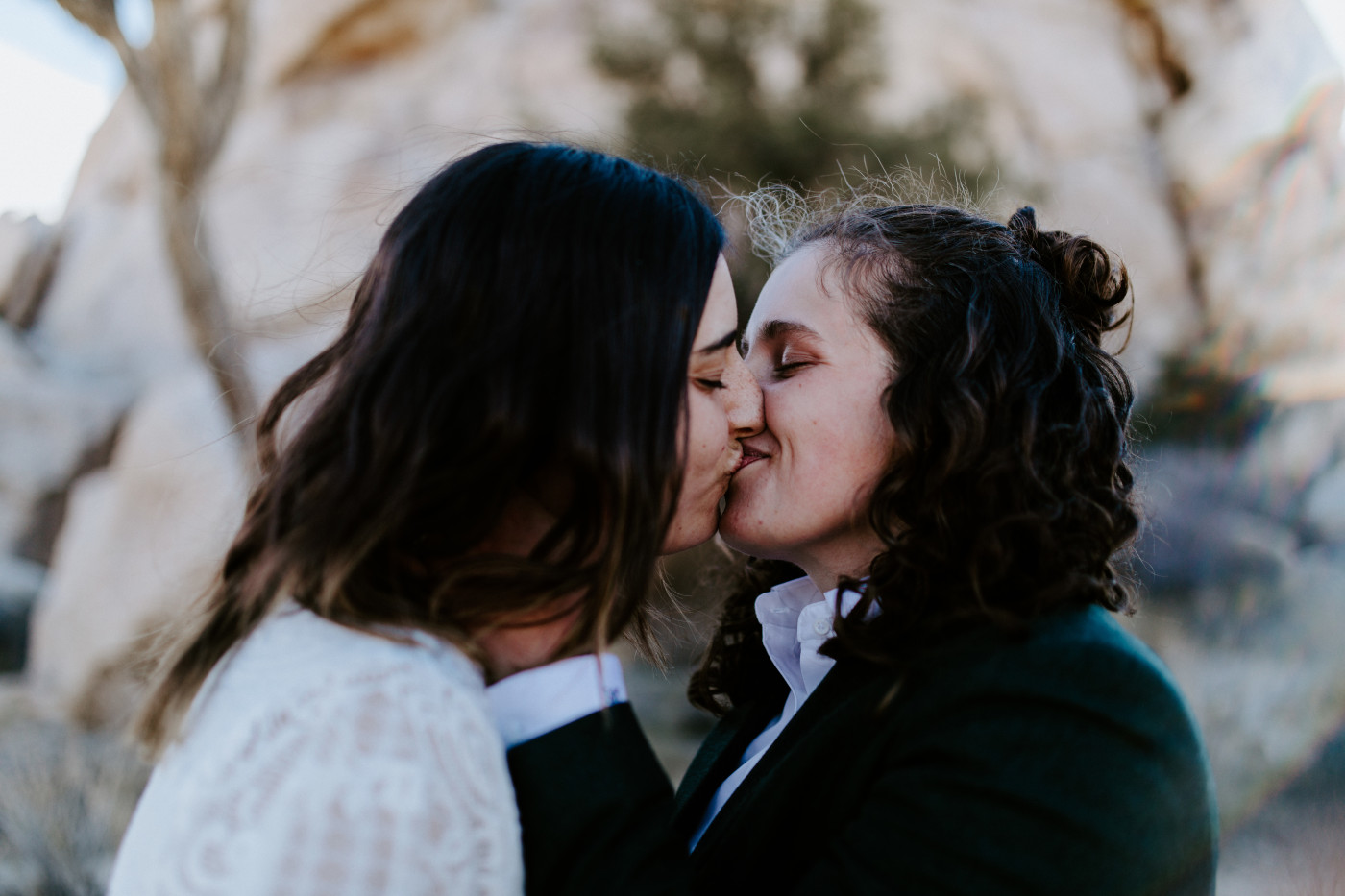 Becca and Madison kiss in Joshua Tree.