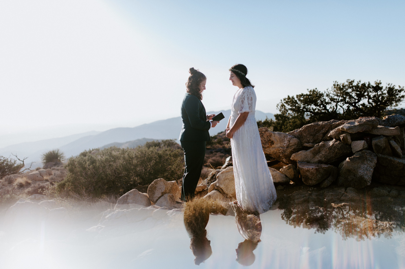 Becca and Madison read their vows during their elopement.