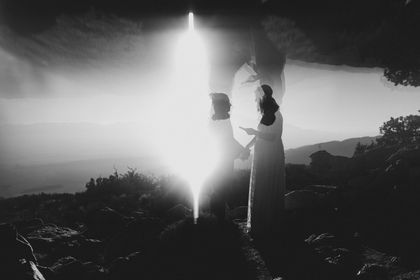 Madison and Becca stand together during their Joshua Tree elopement.