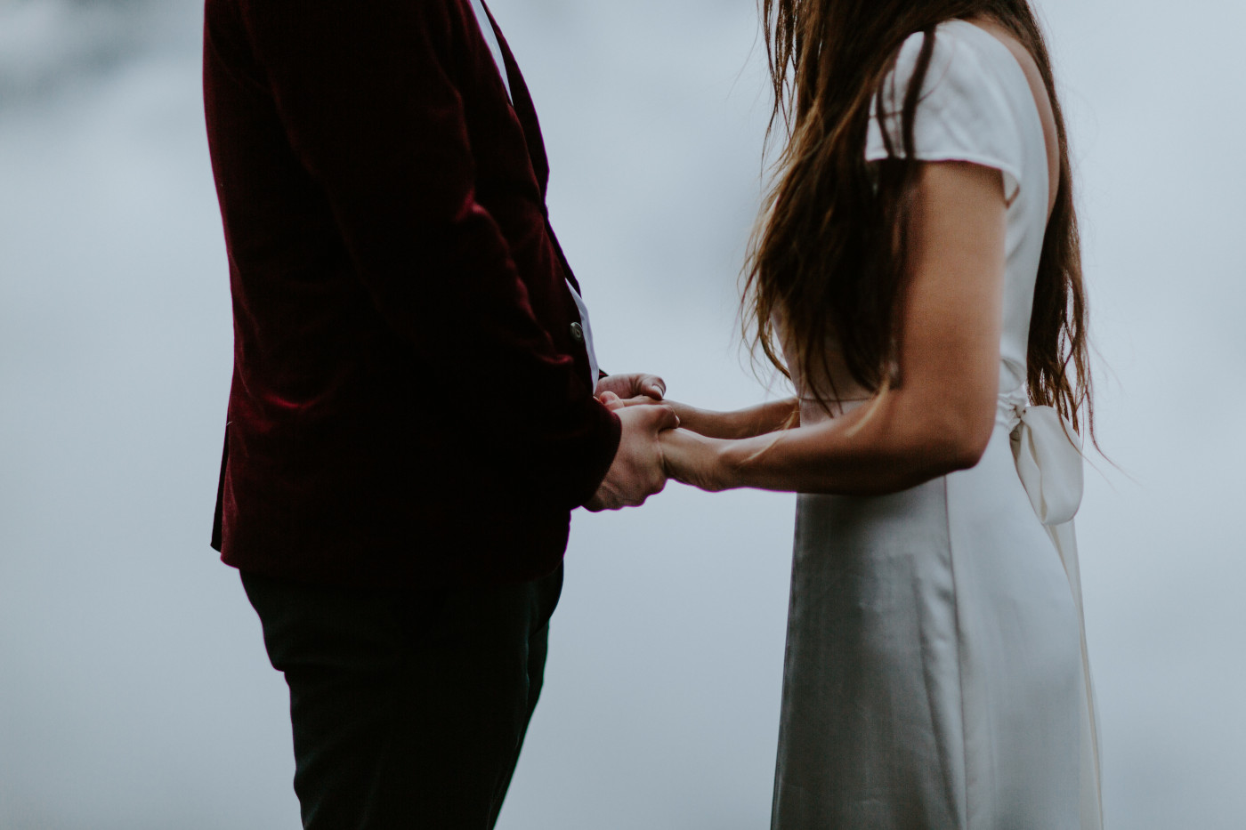 Katelyn and Murray hold hands. Elopement wedding photography at Mount Hood by Sienna Plus Josh.