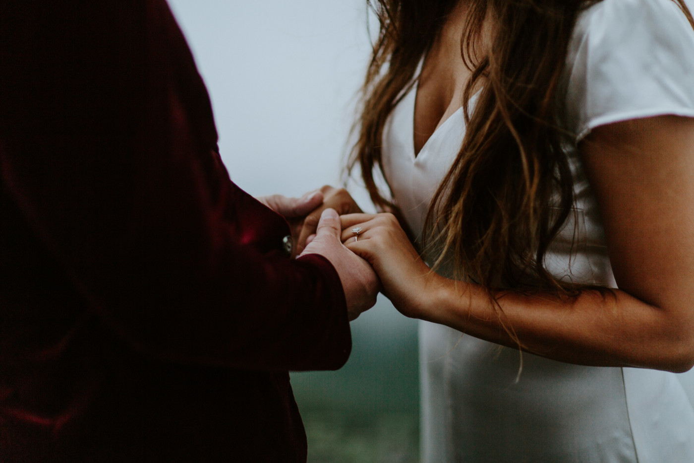 Katelyn and Murray hold hands. Elopement wedding photography at Mount Hood by Sienna Plus Josh.