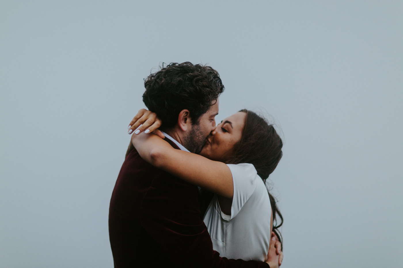 Katelyn and Murray seal their marriage with a kiss. Elopement wedding photography at Mount Hood by Sienna Plus Josh.