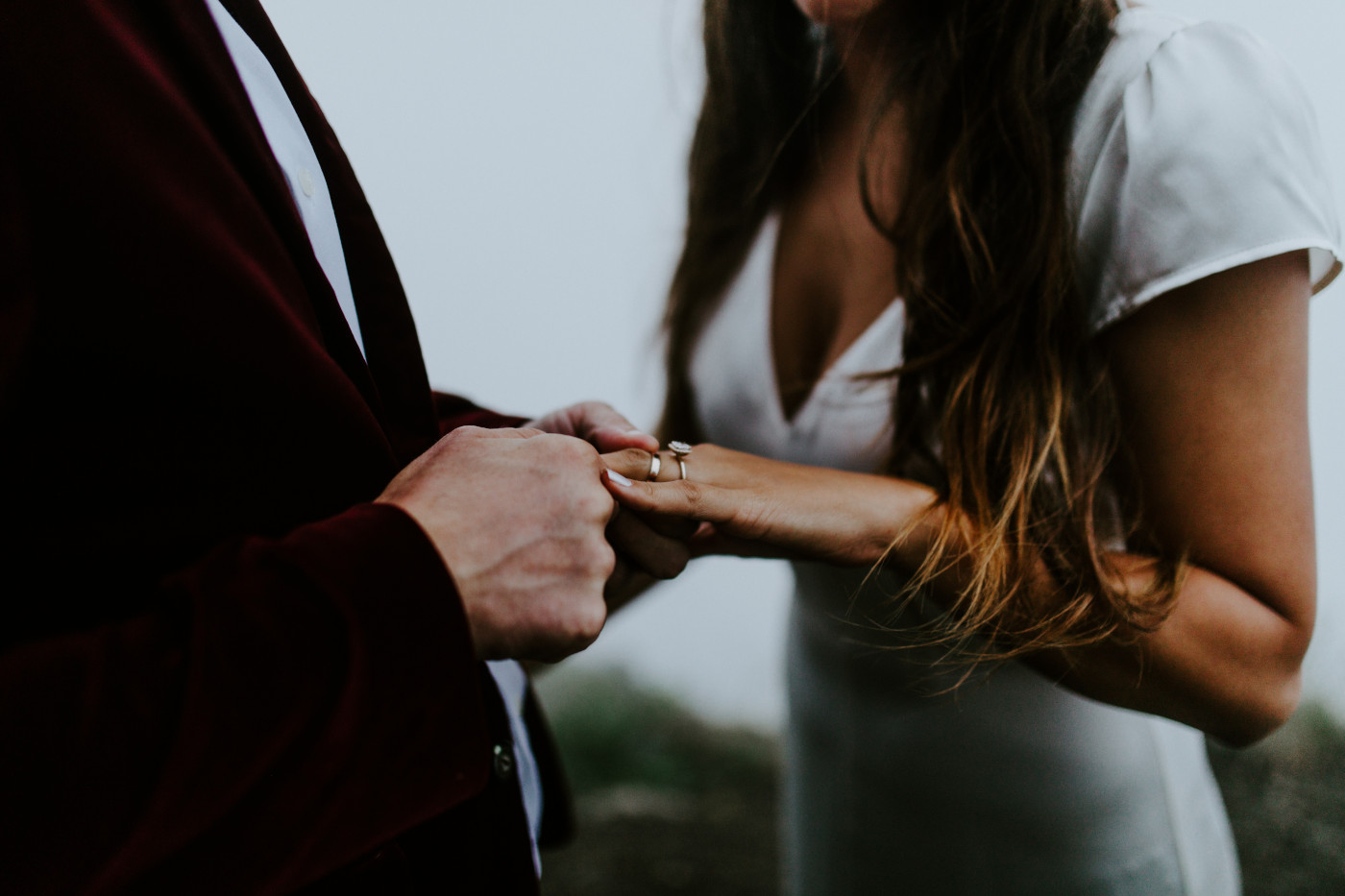 Murray places a ring on Katelyn. Elopement wedding photography at Mount Hood by Sienna Plus Josh.