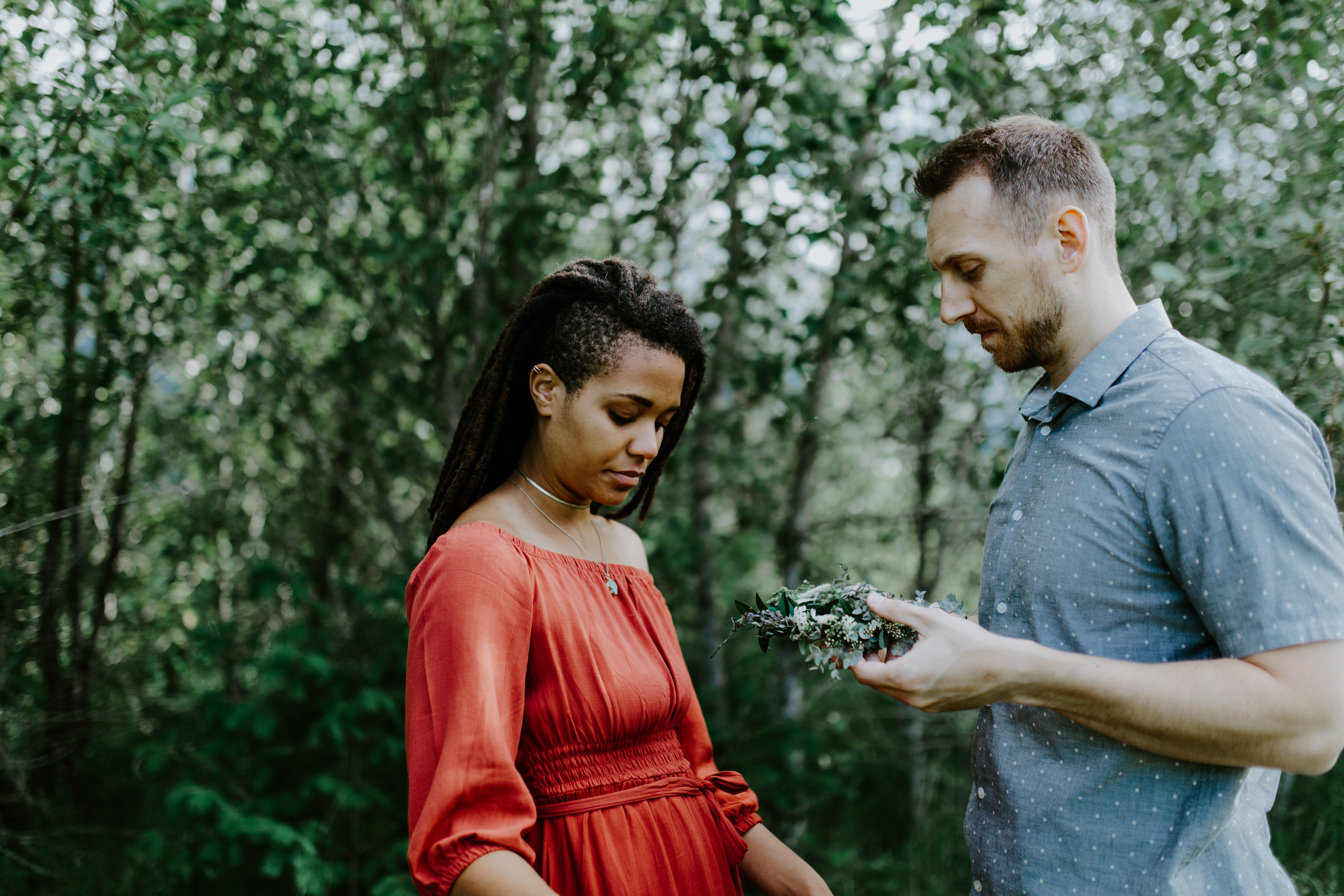 Kayloni and Garrett with a flower crown at the Columbia River Gorge in Oregon. Engagement photography in Portland Oregon by Sienna Plus Josh.