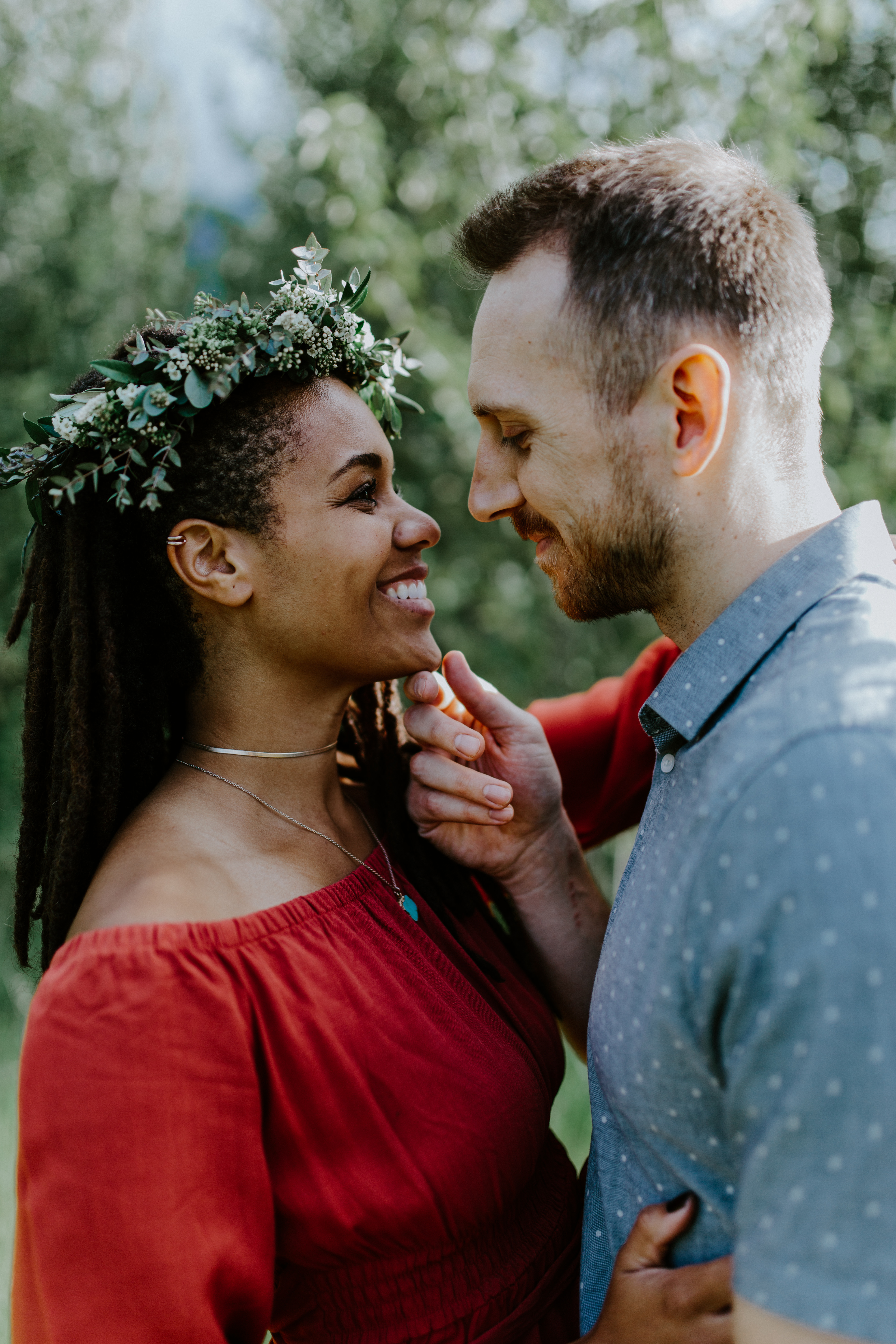 Kayloni and Garrett stare into each others eyes at Cascade Locks, Oregon. Engagement photography in Portland Oregon by Sienna Plus Josh.