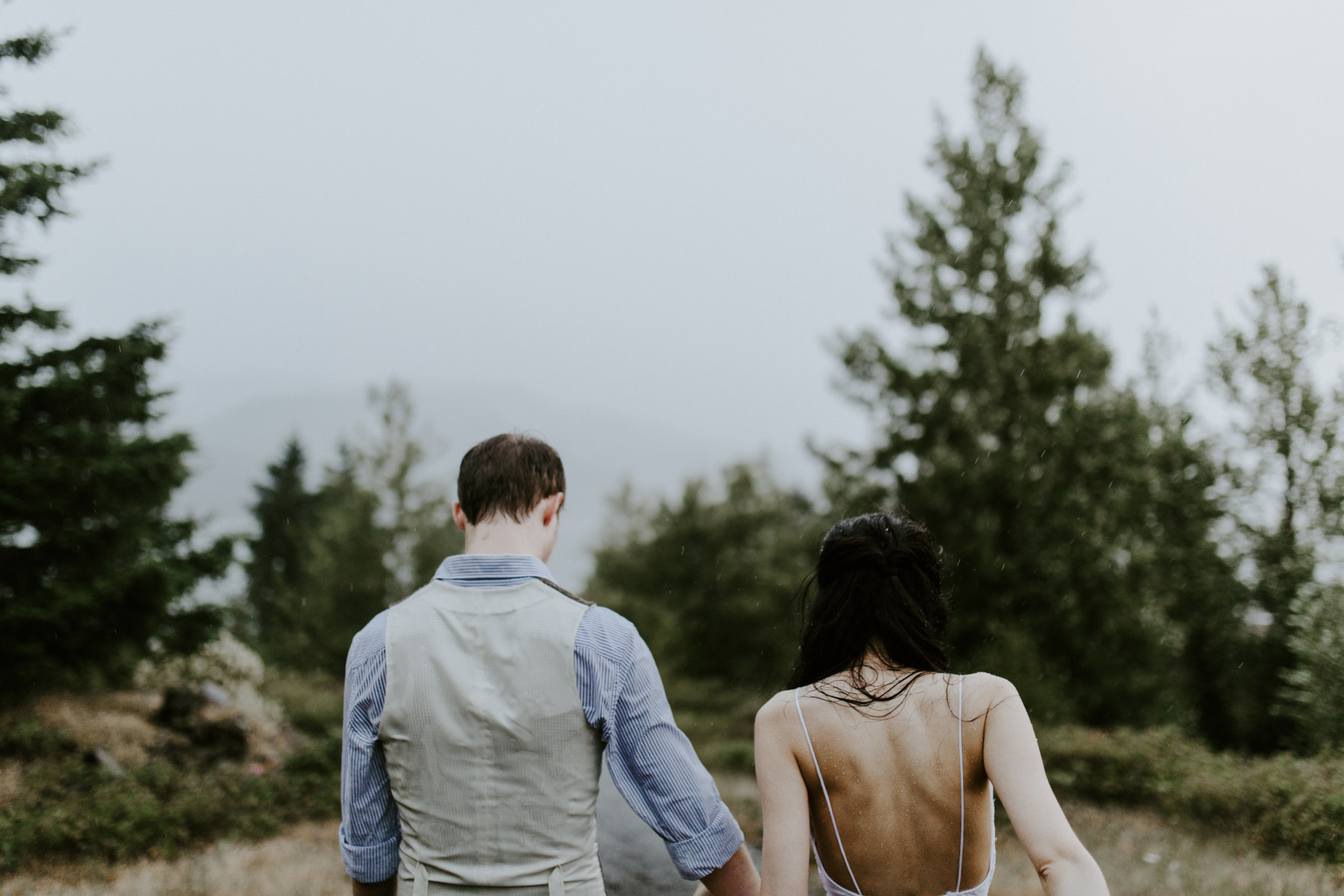 Kimberlie and Jacob hike back toward the trailhead. Elopement wedding photography at Cascade Locks by Sienna Plus Josh.