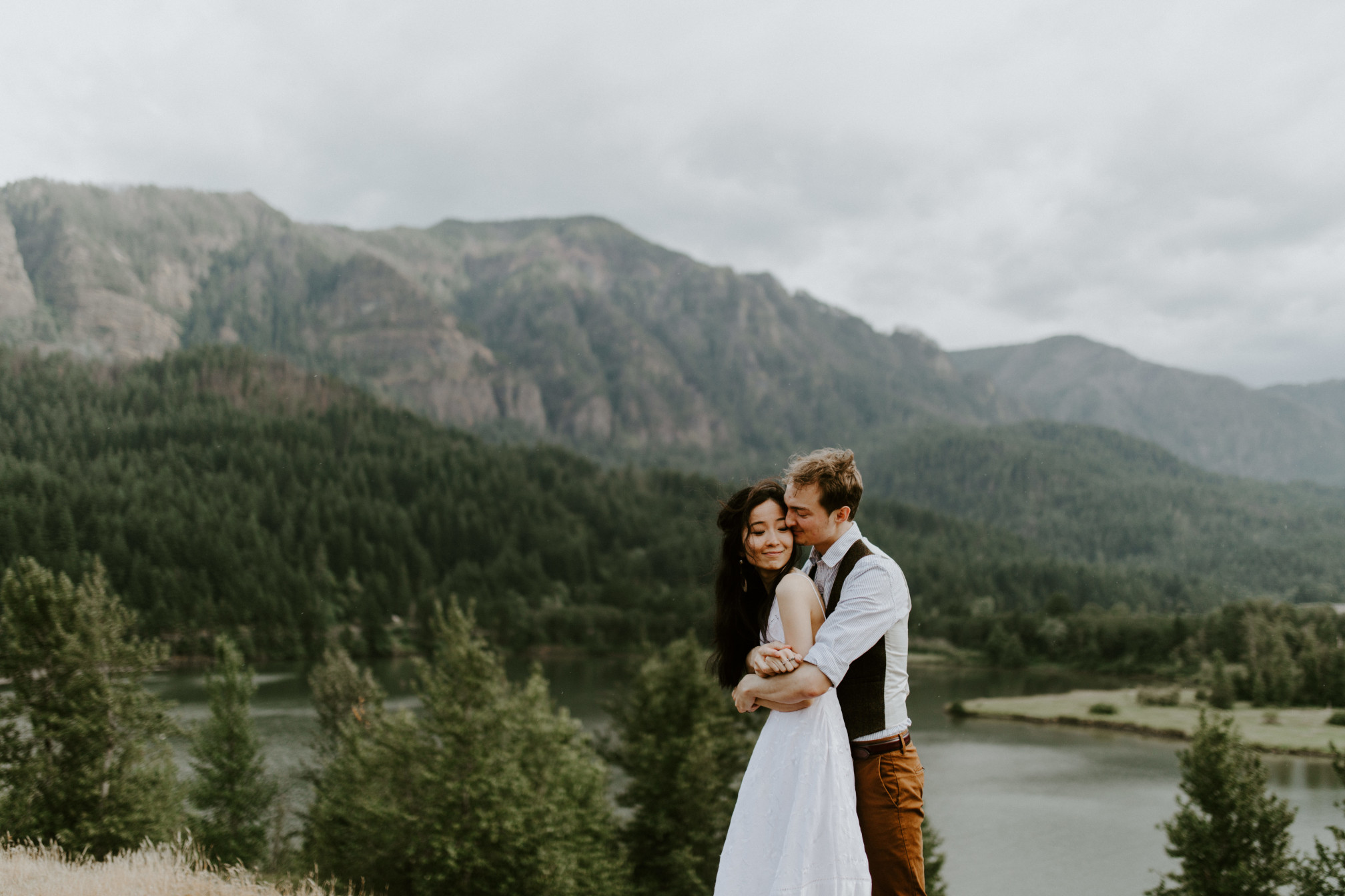 Jacob and Kimberlie cheek to cheek. Elopement wedding photography at Cascade Locks by Sienna Plus Josh.