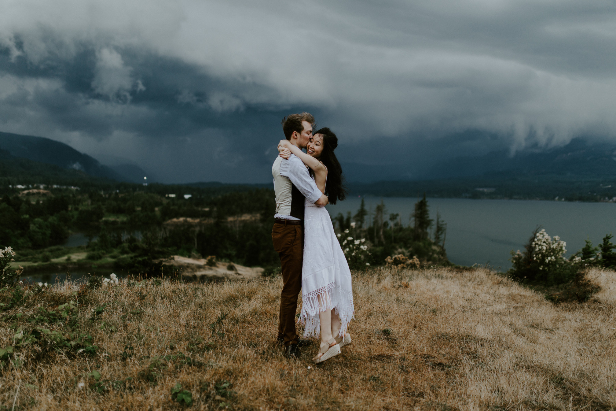 Jacob and Kimberlie hug at Cascade Locks, OR. Elopement wedding photography at Cascade Locks by Sienna Plus Josh.