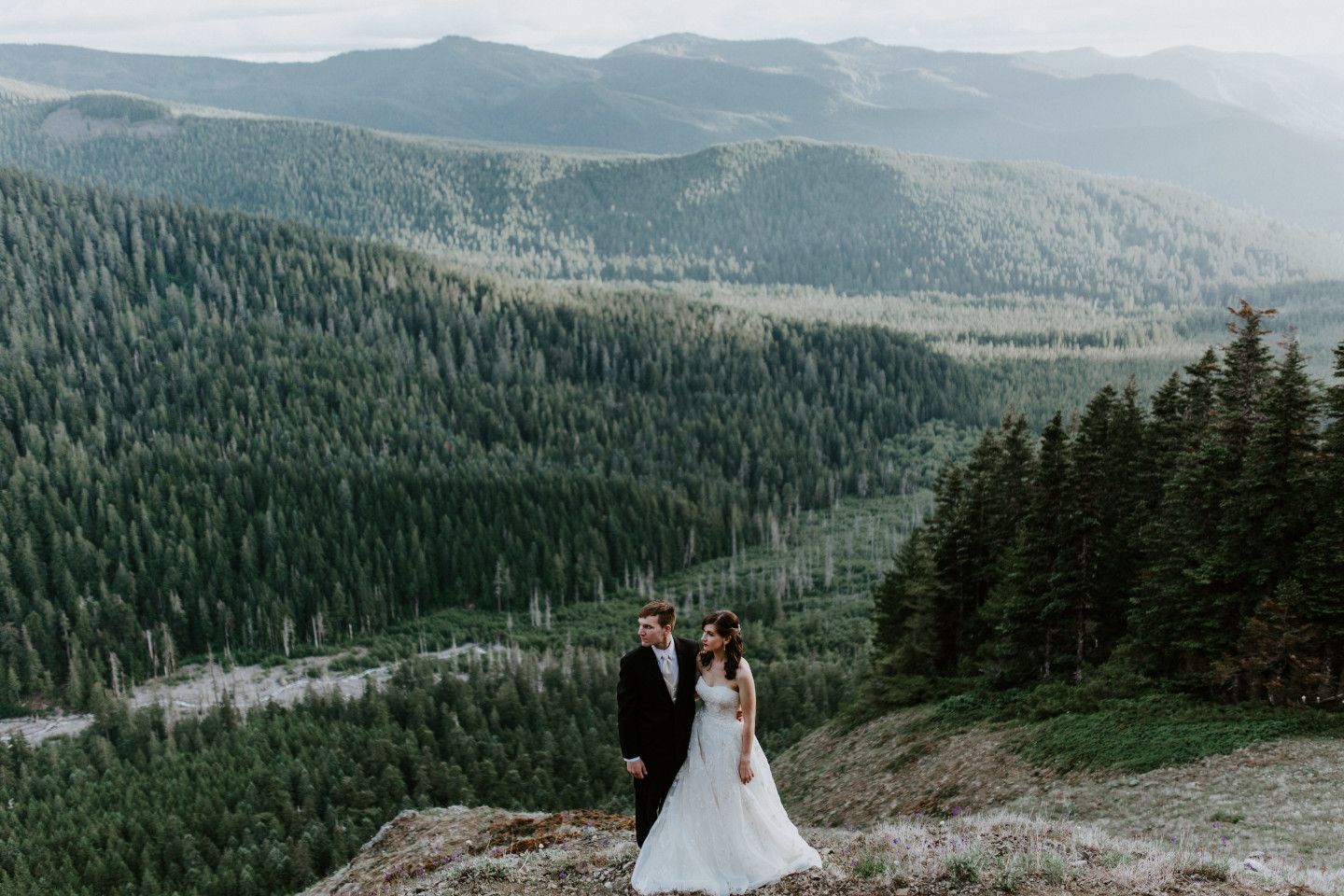 Moira and Ryan stand along the trail to Mount Hood. Adventure elopement wedding shoot by Sienna Plus Josh.