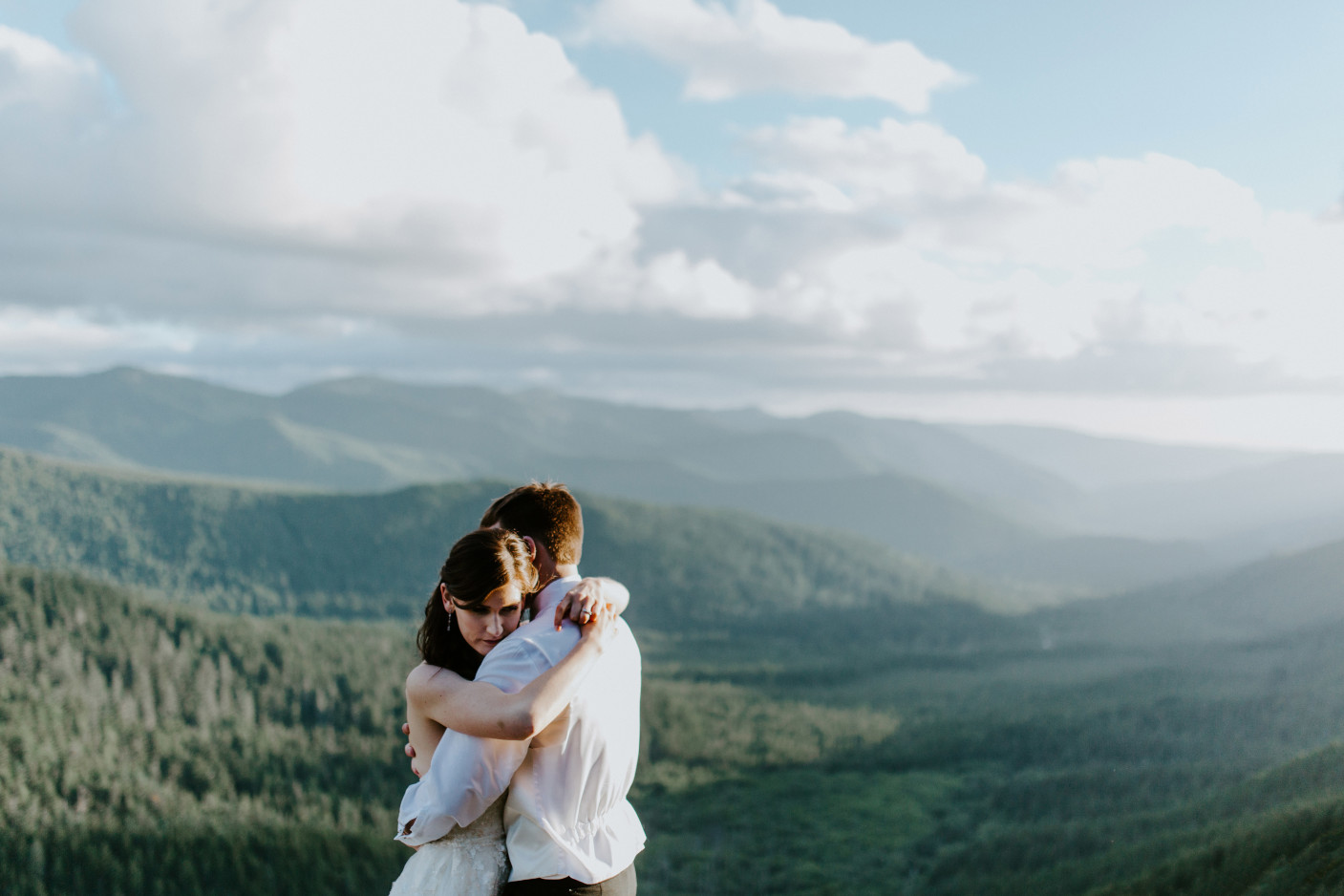 Ryan and Moira hug. Adventure elopement wedding shoot by Sienna Plus Josh.