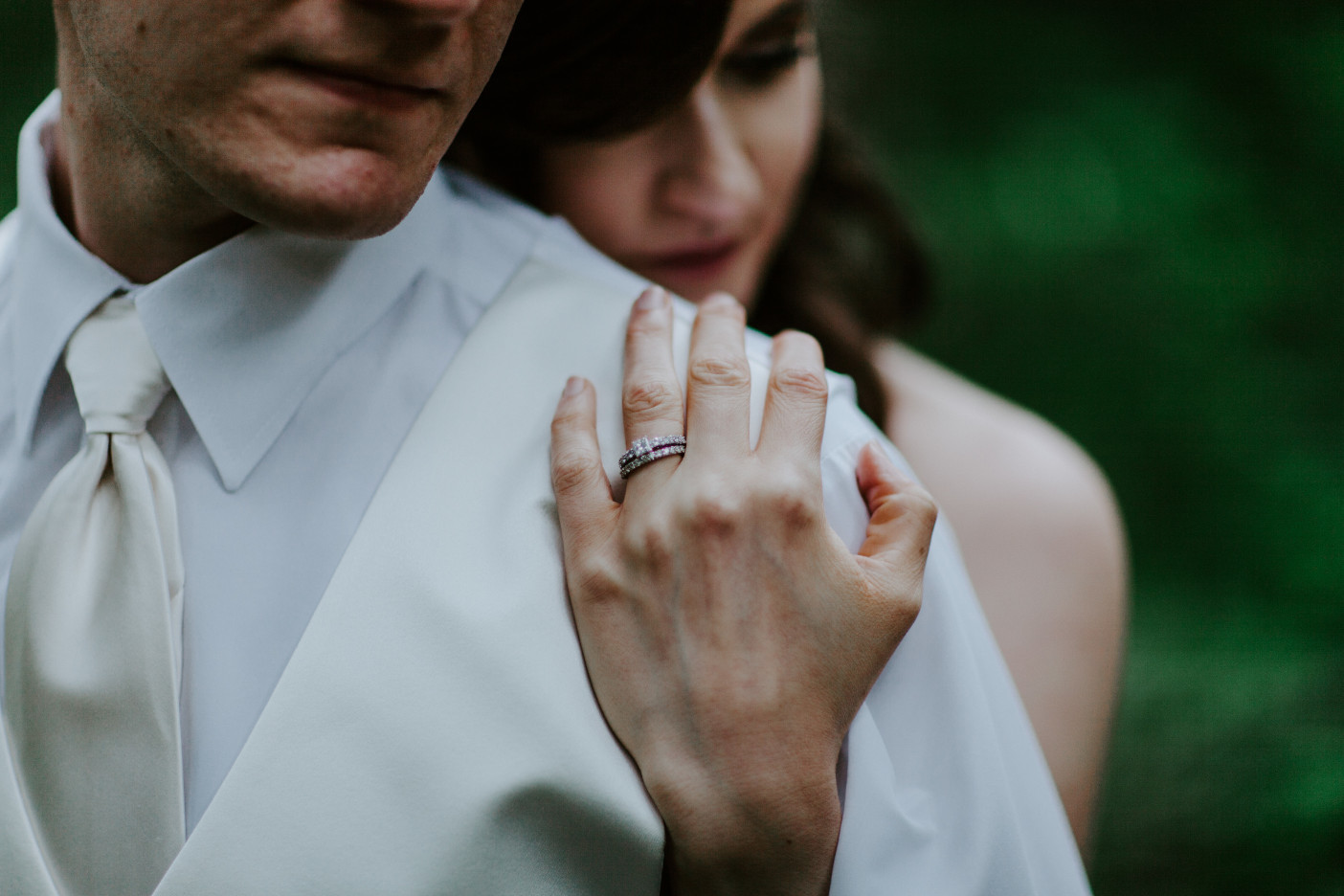 Moira holds Ryan, showing her ring, on the trail to Mount Hood. Adventure elopement wedding shoot by Sienna Plus Josh.