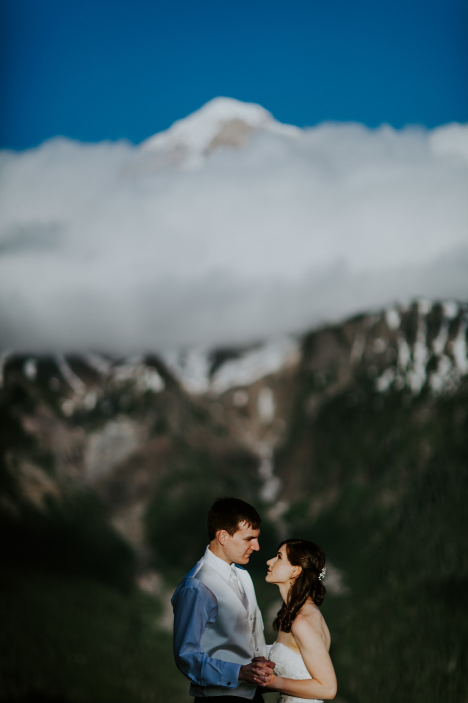 Ryan and Moira hug on the trail near Mount Hood. Adventure elopement wedding shoot by Sienna Plus Josh.