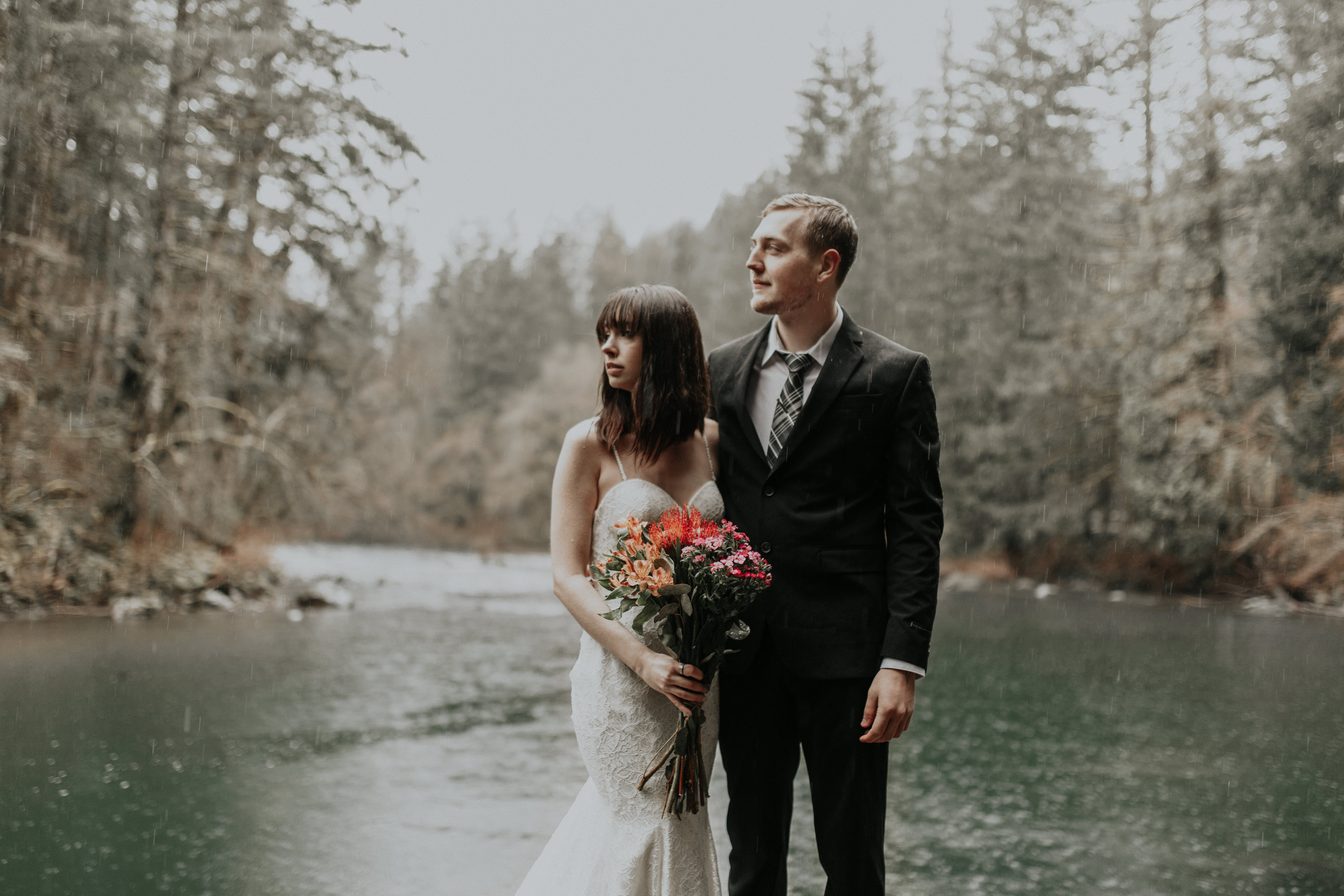 Paige and TJ near the Moulton Falls river for their intimate wedding in Washington state.