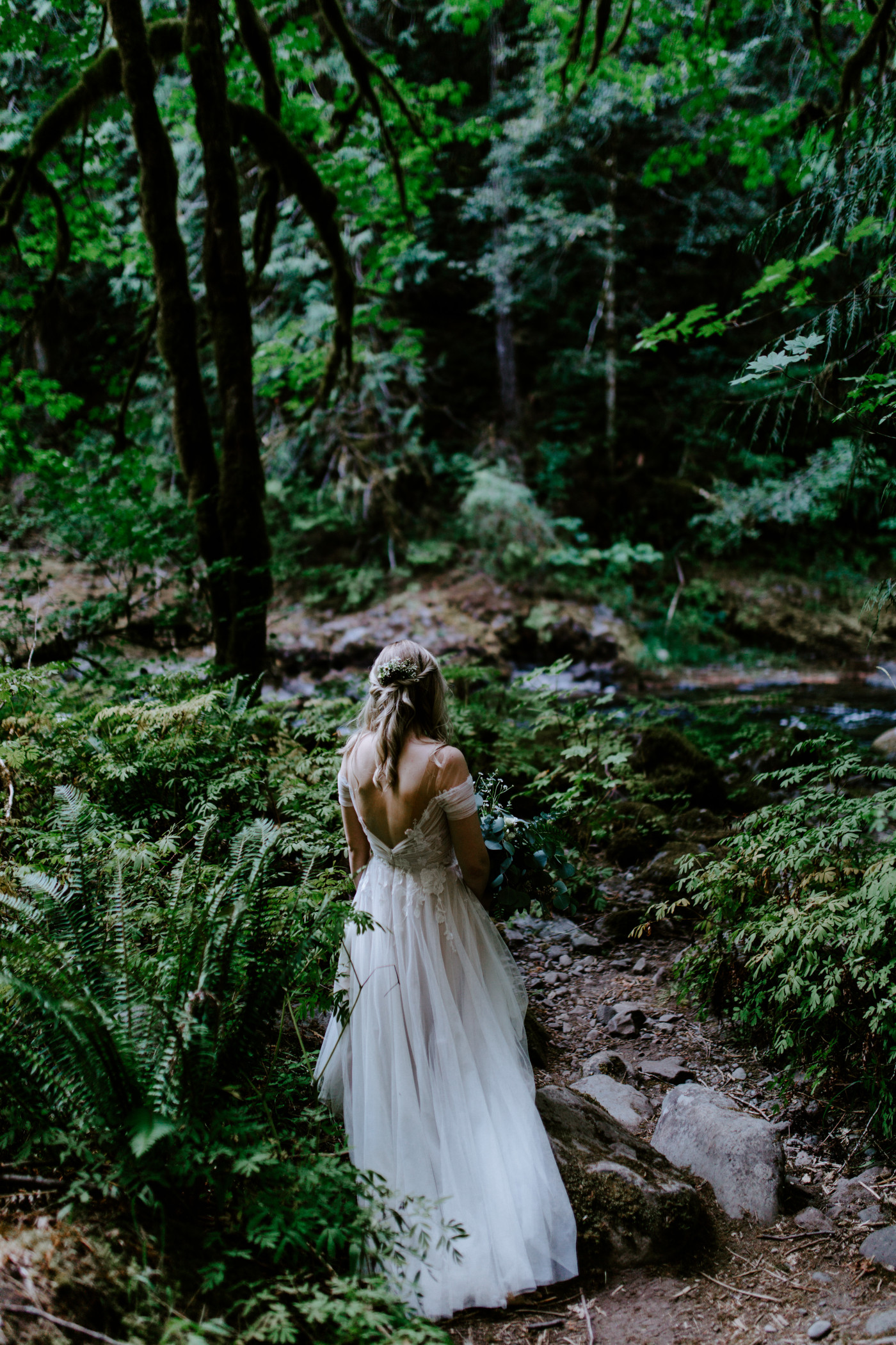 Kylie walks towards Corey for their elopement ceremony.