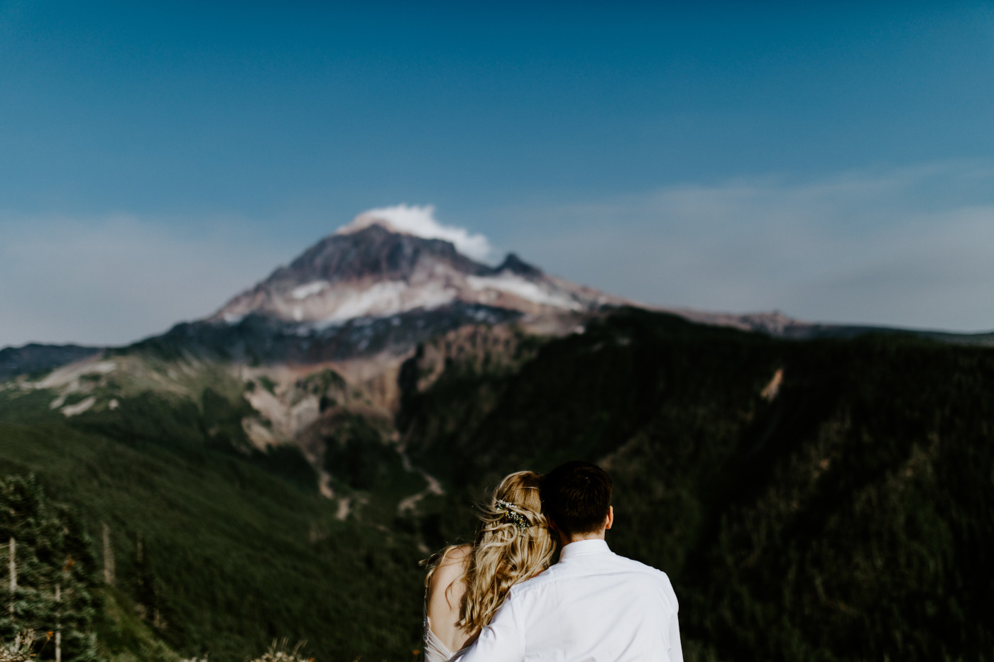 Kylie and Corey look out onto Mount Hood.