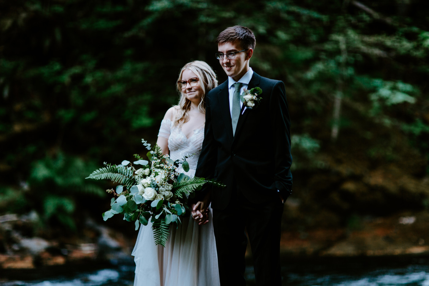 Kylie holds onto Corey during their elopement.