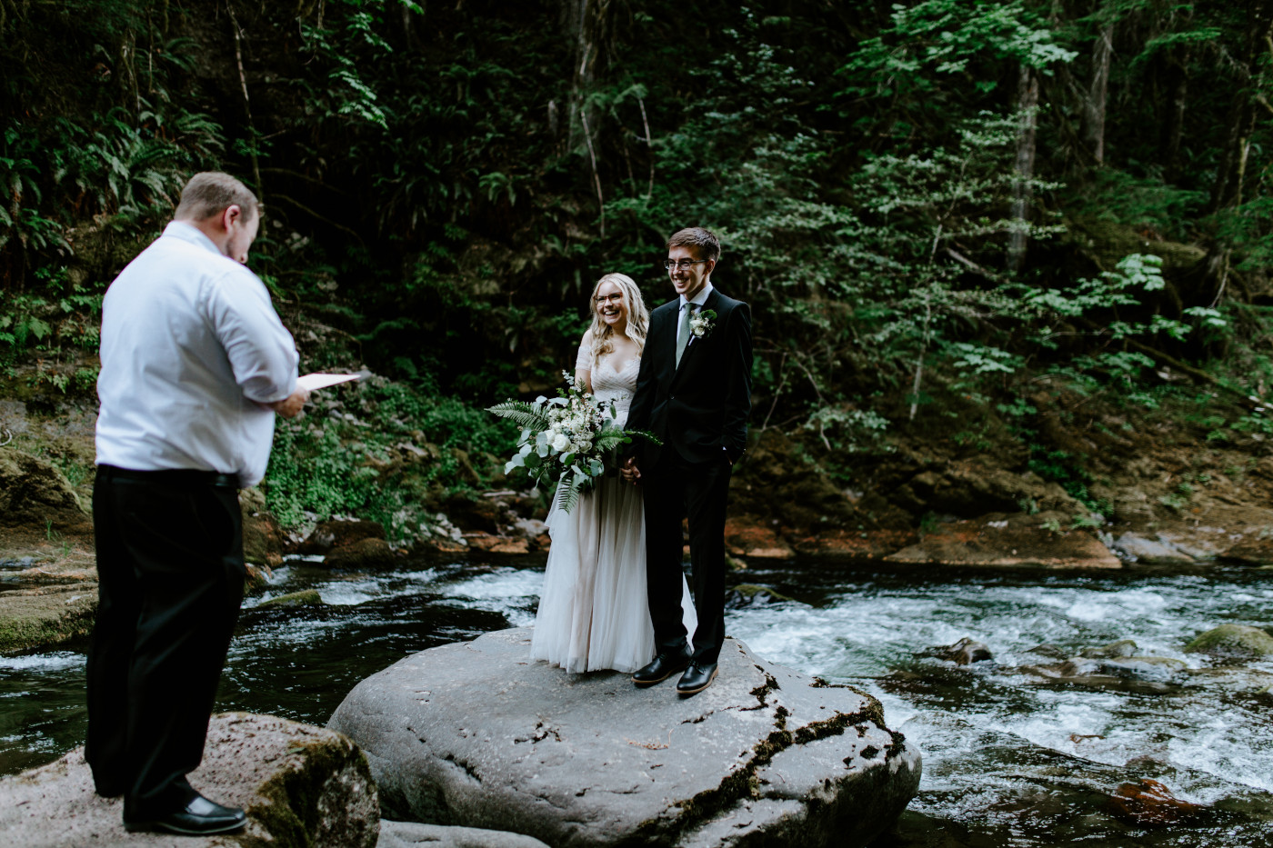 Kylie and Corey listen to their officiant.