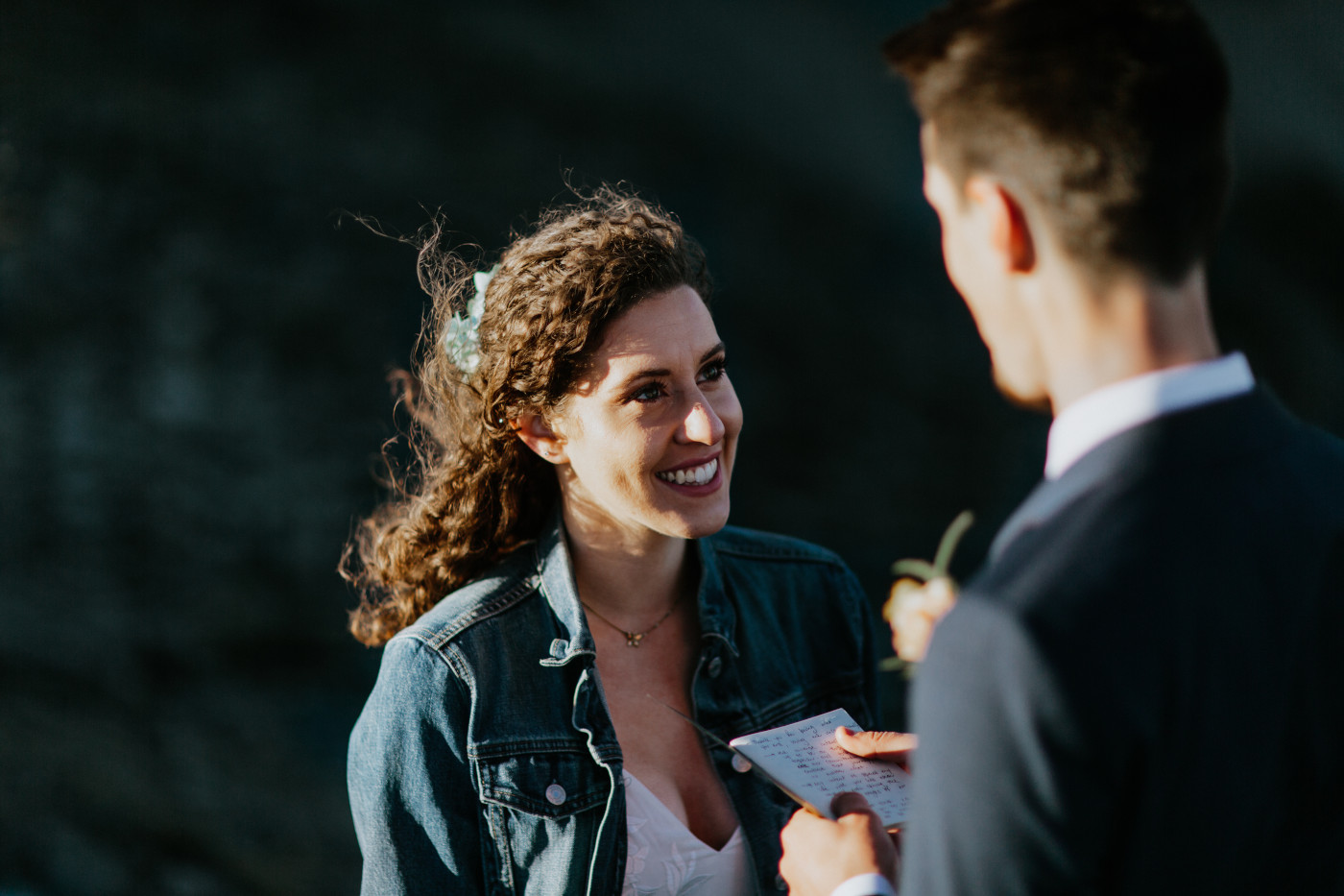 Chad reads vows to Tasha. Elopement photography at Mount Rainier by Sienna Plus Josh.