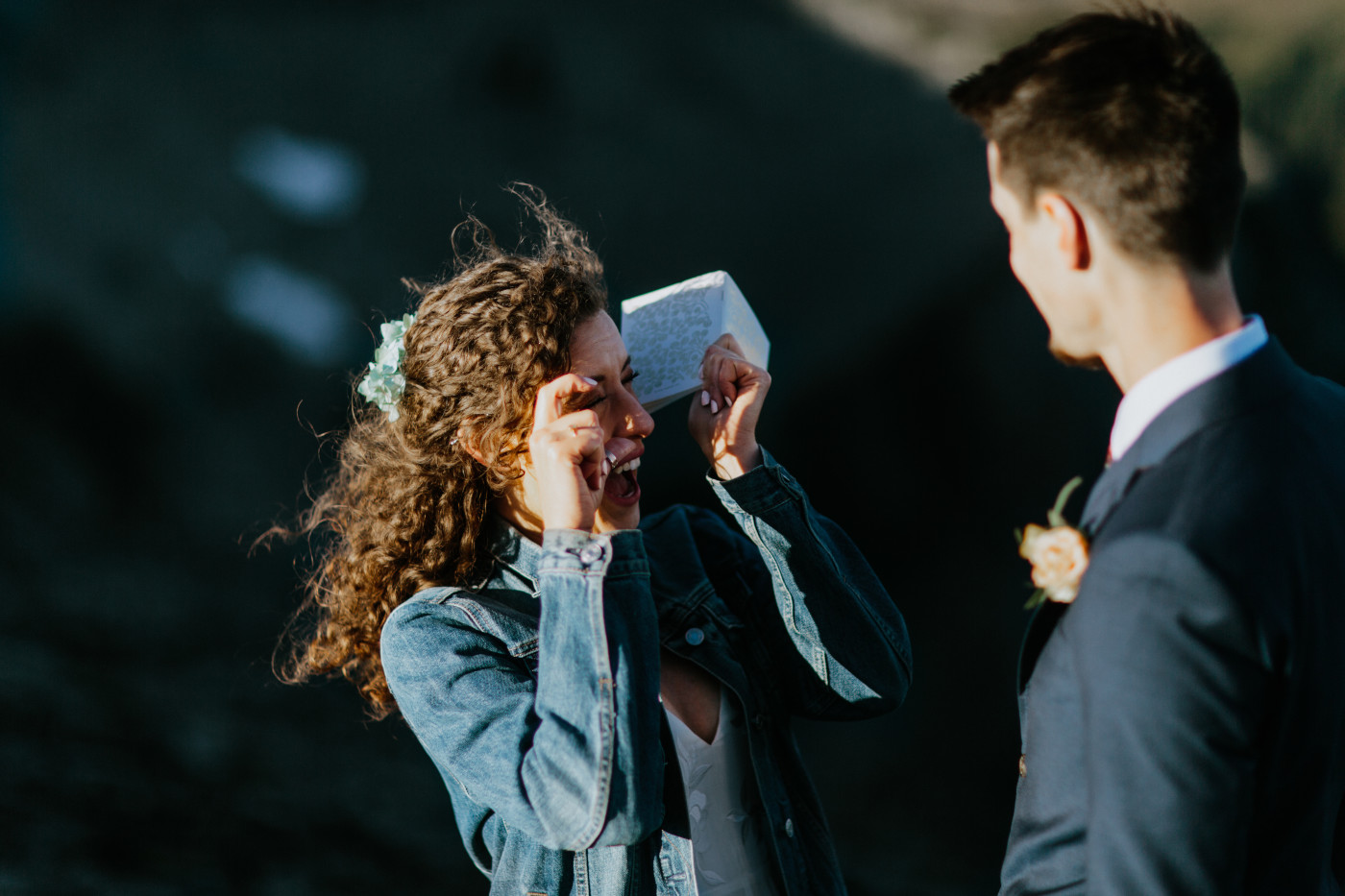 Tasha pretends to take a picture of Chad. Elopement photography at Mount Rainier by Sienna Plus Josh.