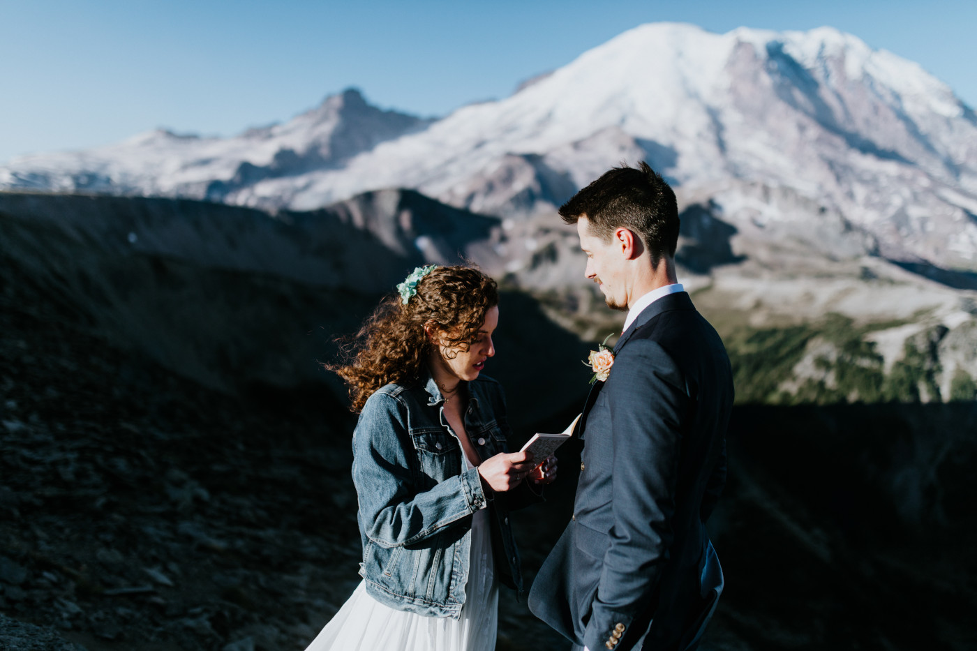 Chad listens to Tasha. Elopement photography at Mount Rainier by Sienna Plus Josh.