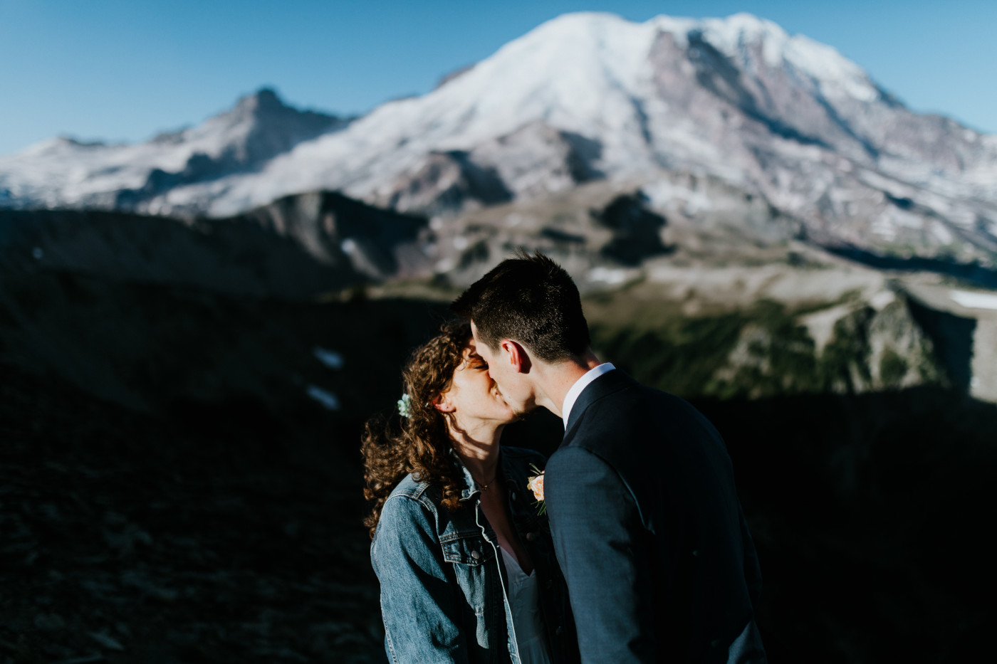 Tasha and Chad kiss. Elopement photography at Mount Rainier by Sienna Plus Josh.