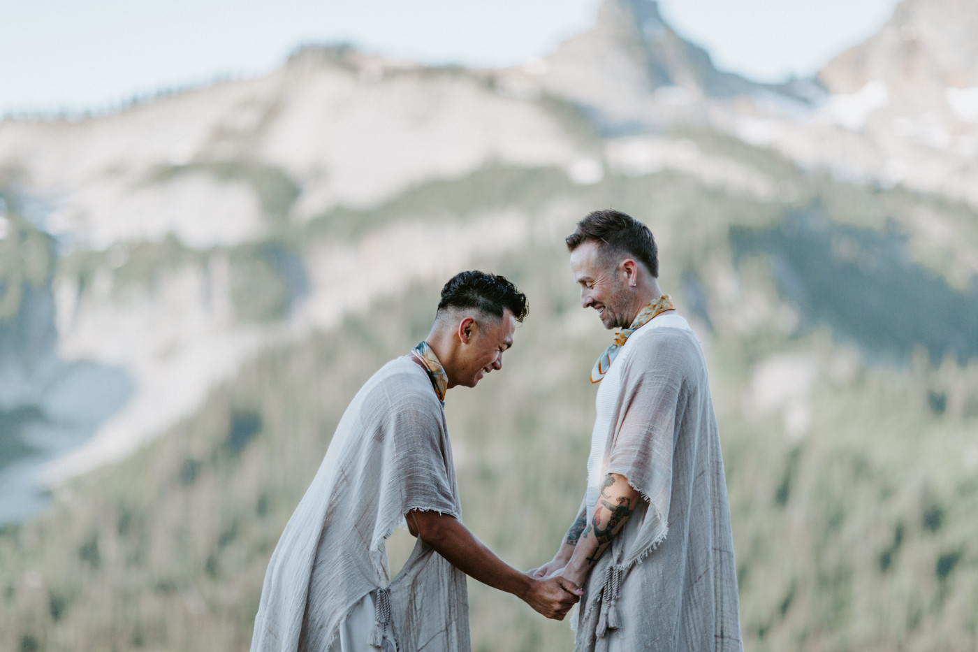 Brooks and Fred share a laugh during their elopement in Mount Rainier.