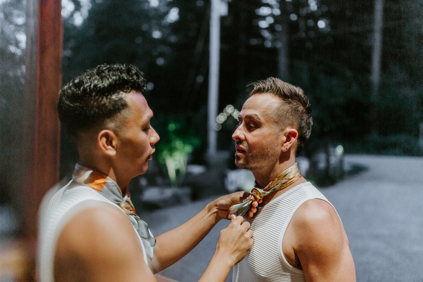 Fred and Brooks help each other get ready before their Mount Rainier Elopement.
