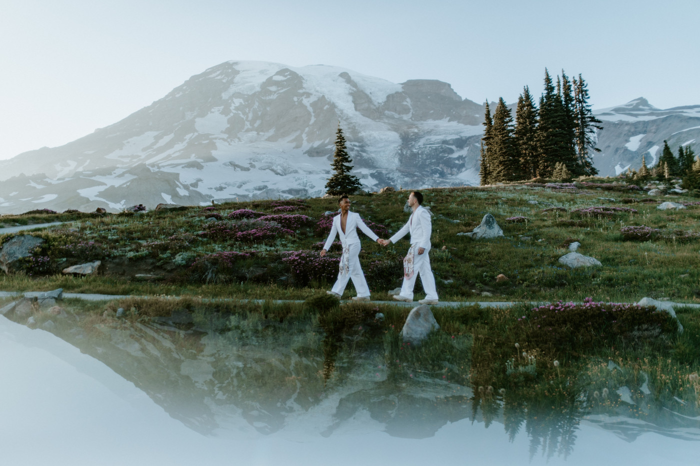 Brooks and Fred walk on a trail at Mount Rainier.