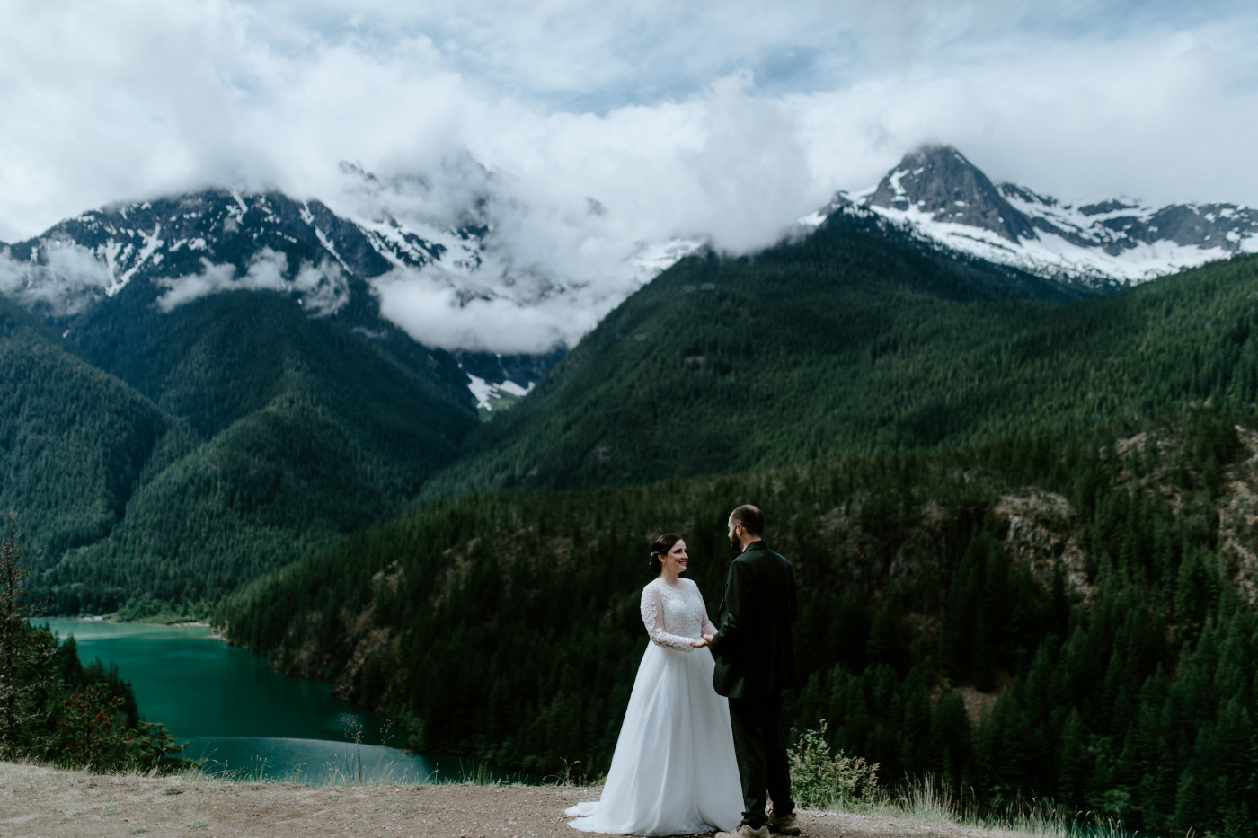 Alex and Elizabeth hold hands. Elopement photography at North Cascades National Park by Sienna Plus Josh.