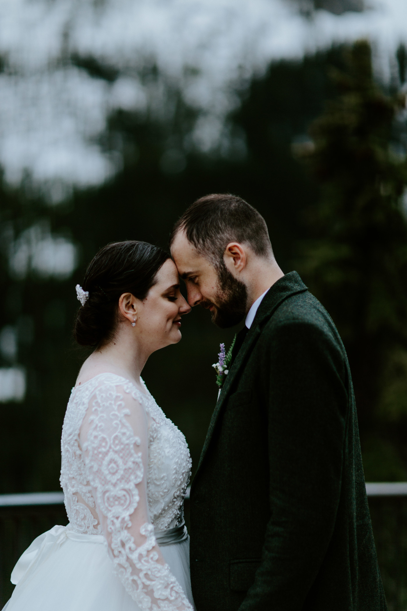 Elizabeth and Alex look at each other. Elopement photography at North Cascades National Park by Sienna Plus Josh.