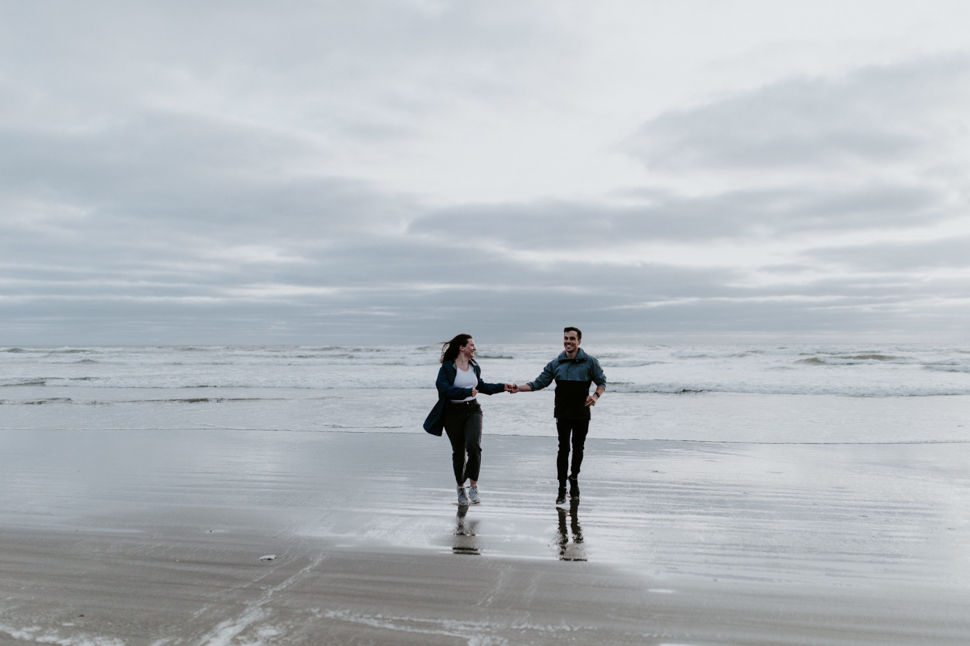 Taylor and Kyle running. Elopement photography at North Cascades National Park by Sienna Plus Josh.