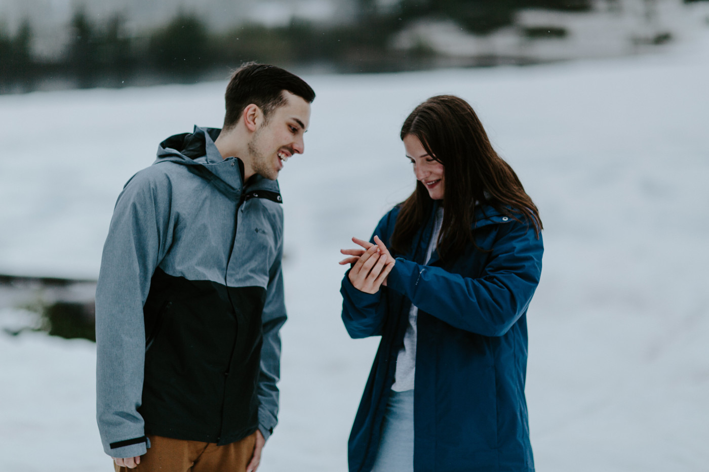 Taylor admires her ring. Elopement photography at North Cascades National Park by Sienna Plus Josh.