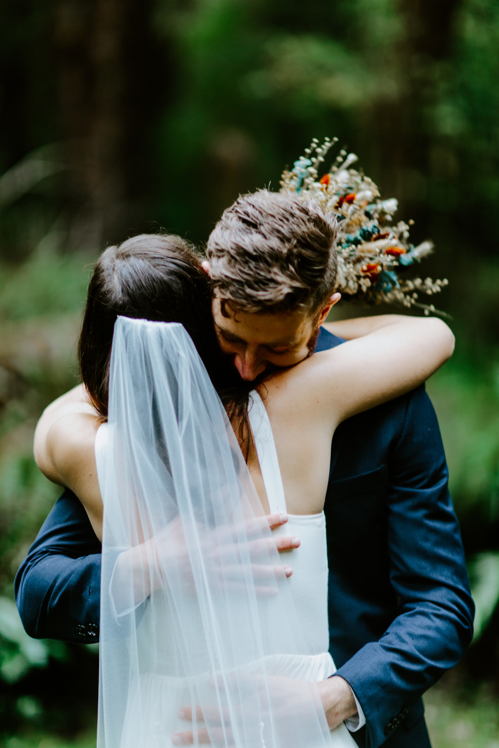 Corey and Mollie hug. Elopement photography in the Olympic National Park by Sienna Plus Josh.