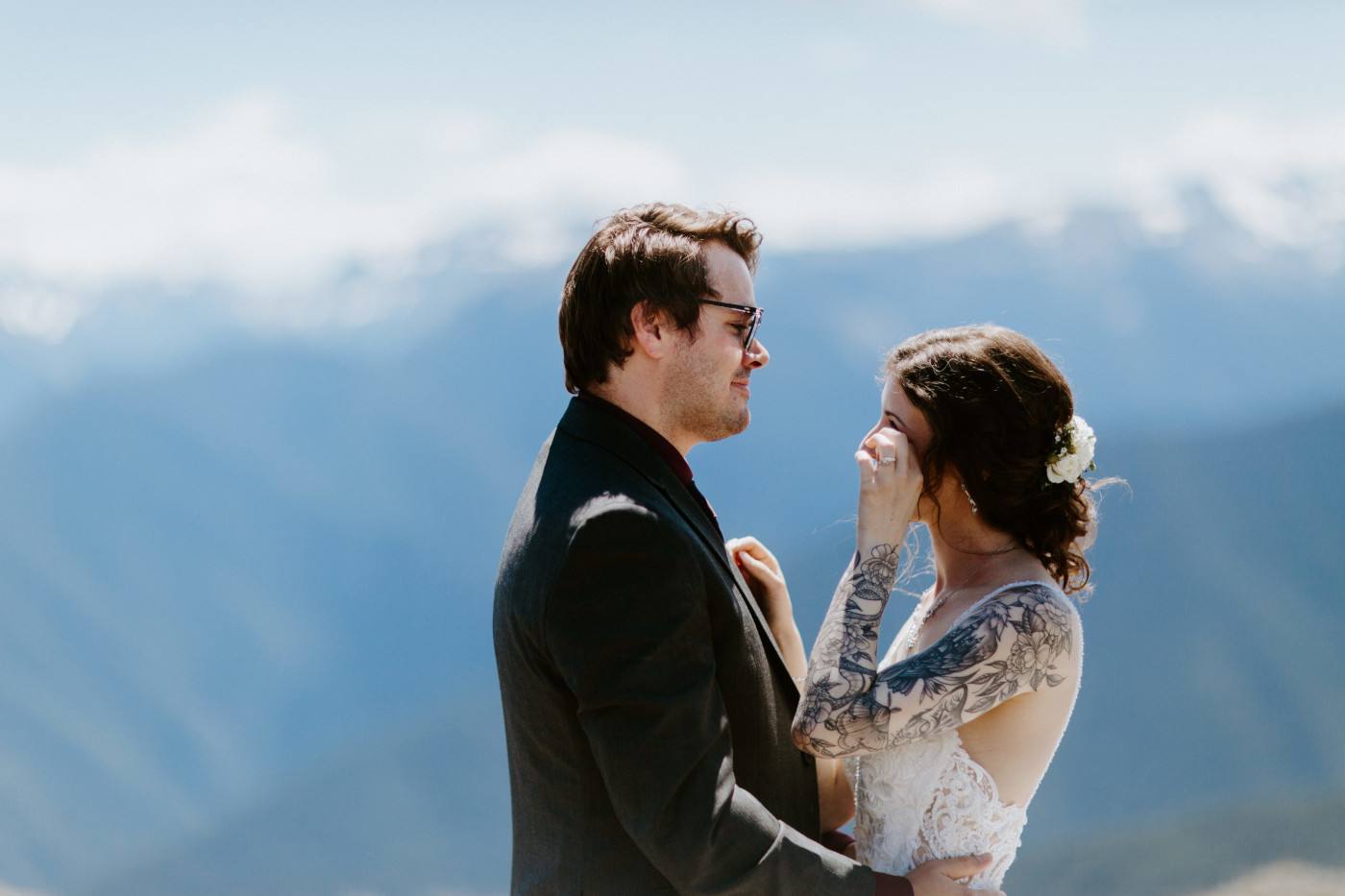 The groom and bride share a moment at Olympic National Park.