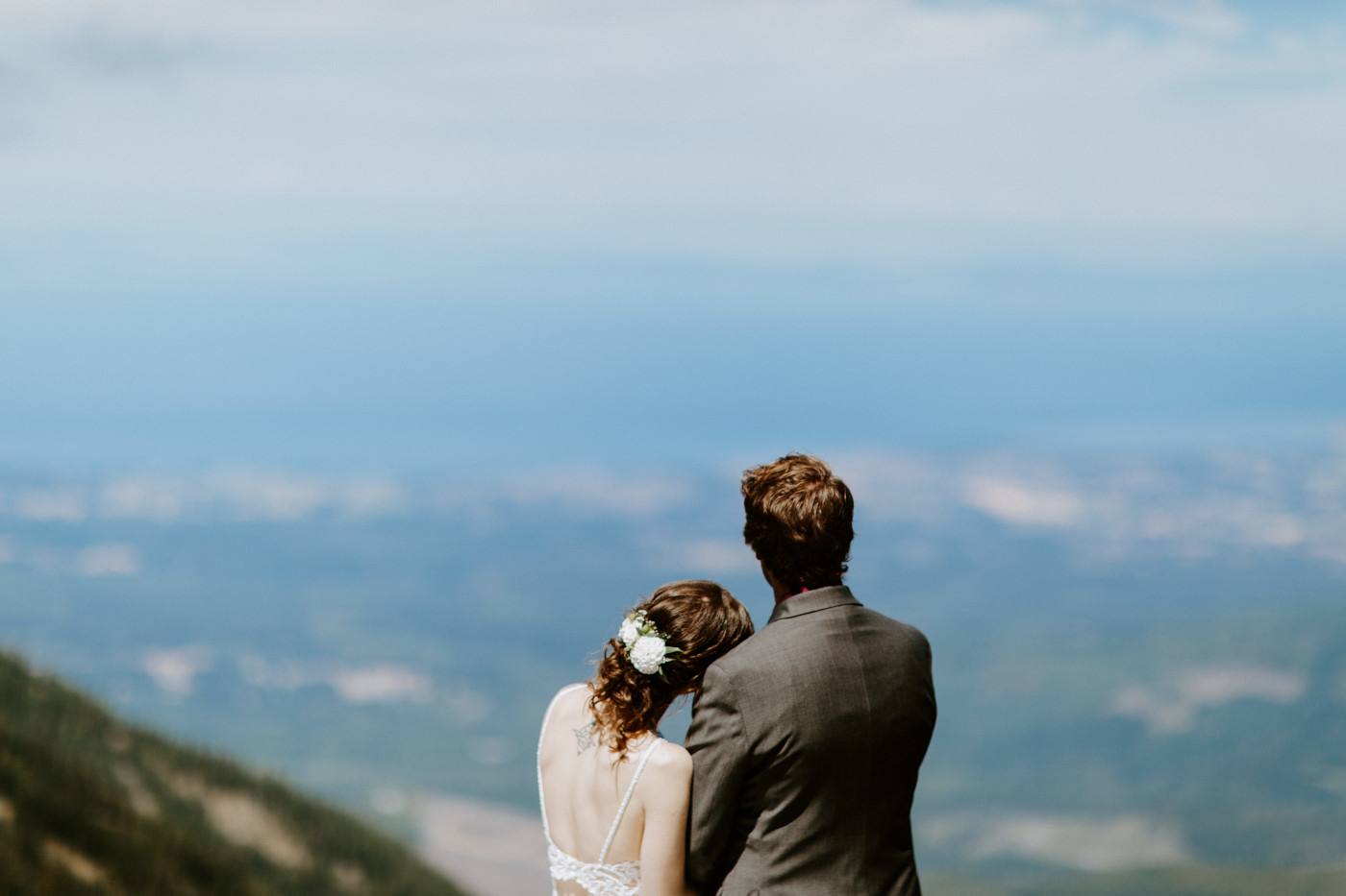 The bride and groom admire the view at Olympic National Park.
