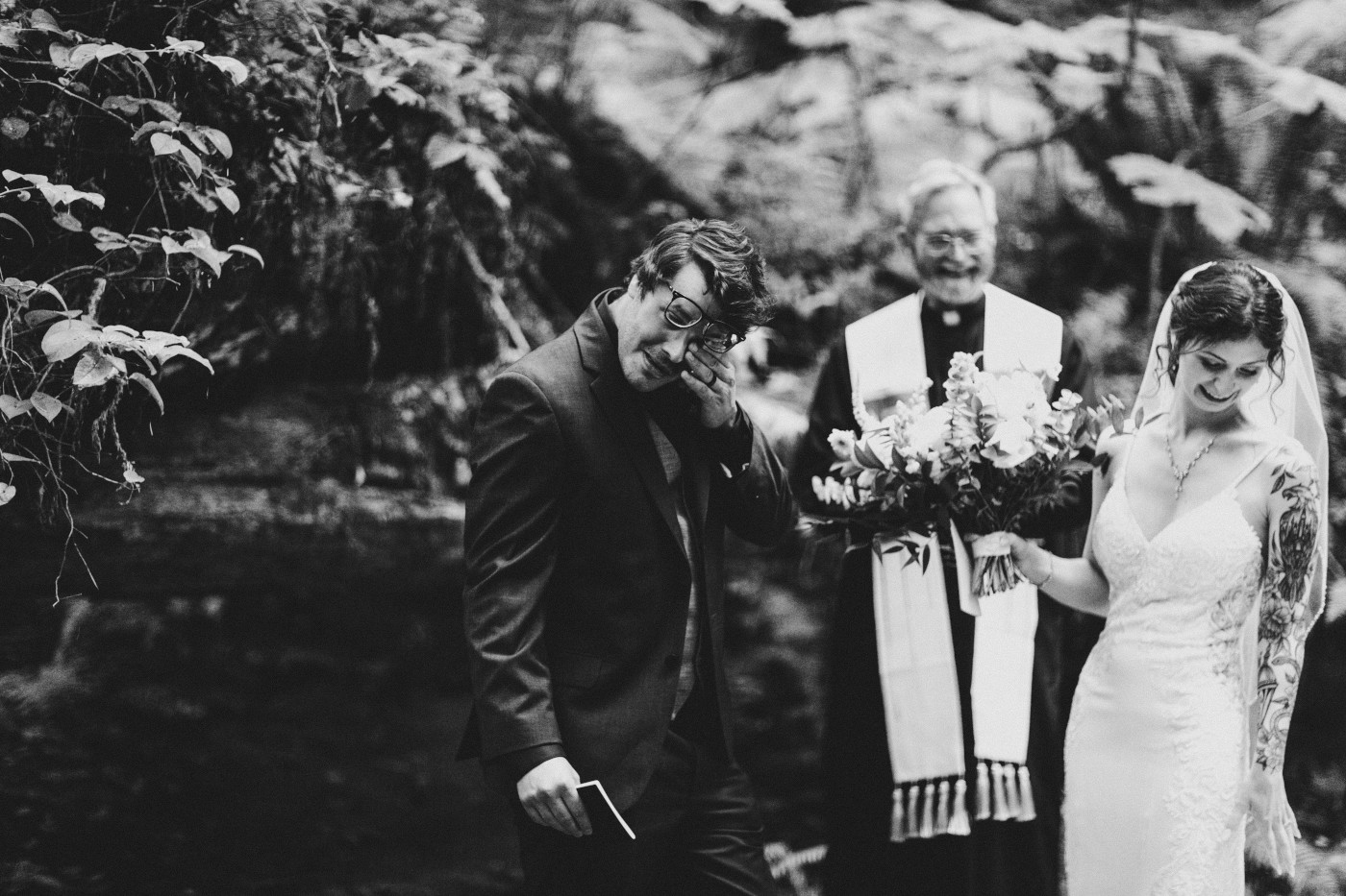 The groom and bride complete the wedding ceremony in Olympic National Park.