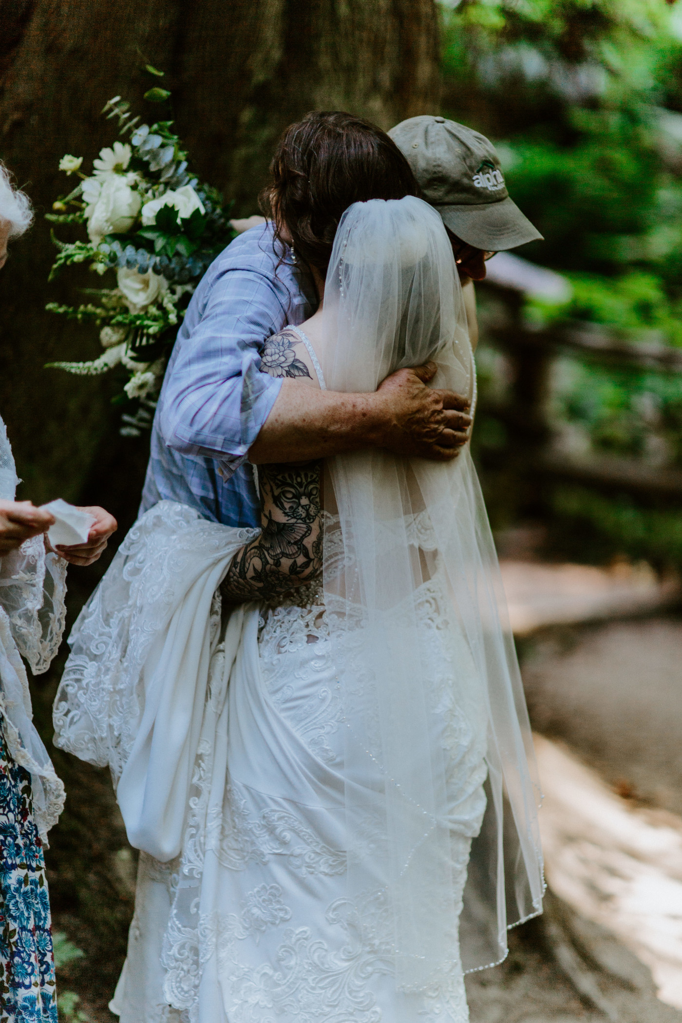 The bride hugs her guests of the elopement in Olympic National Park.