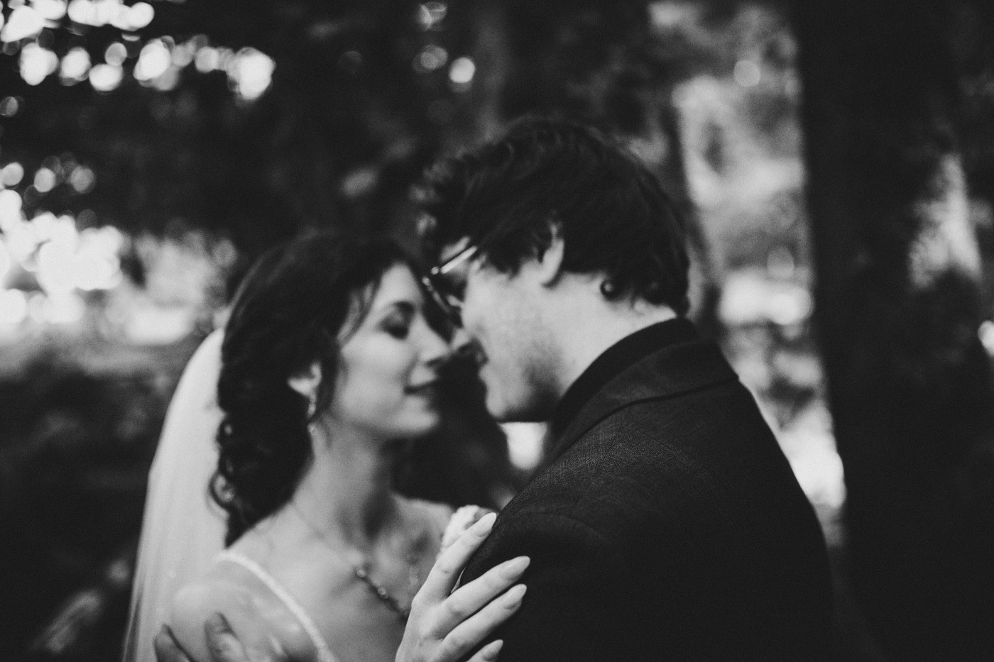The newlywed couple share a kiss after their ceremony in Olympic National Park.