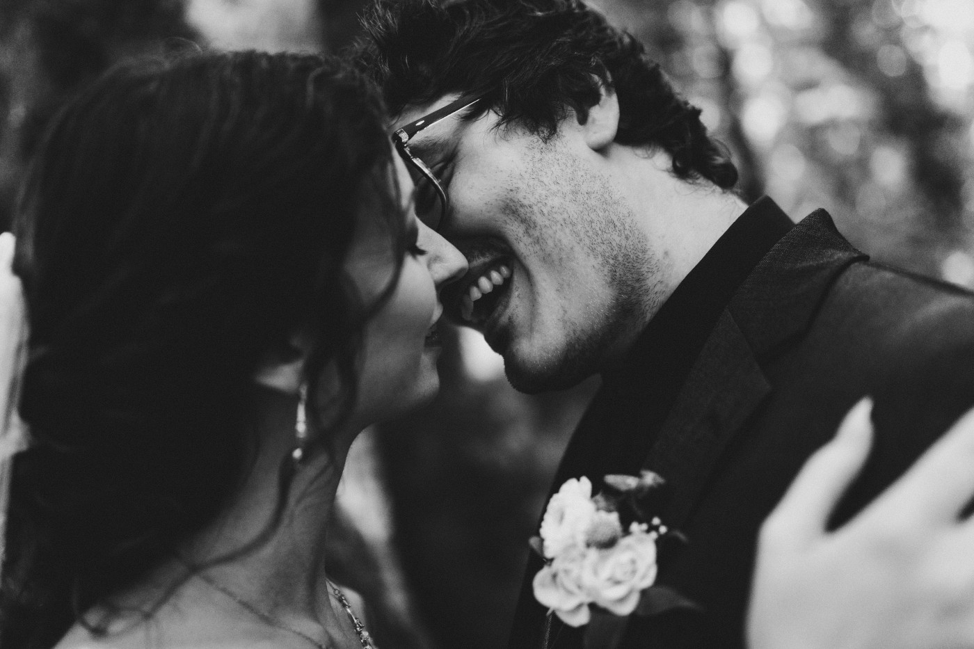 The bride and groom go in for a kiss at Olympic National Park.