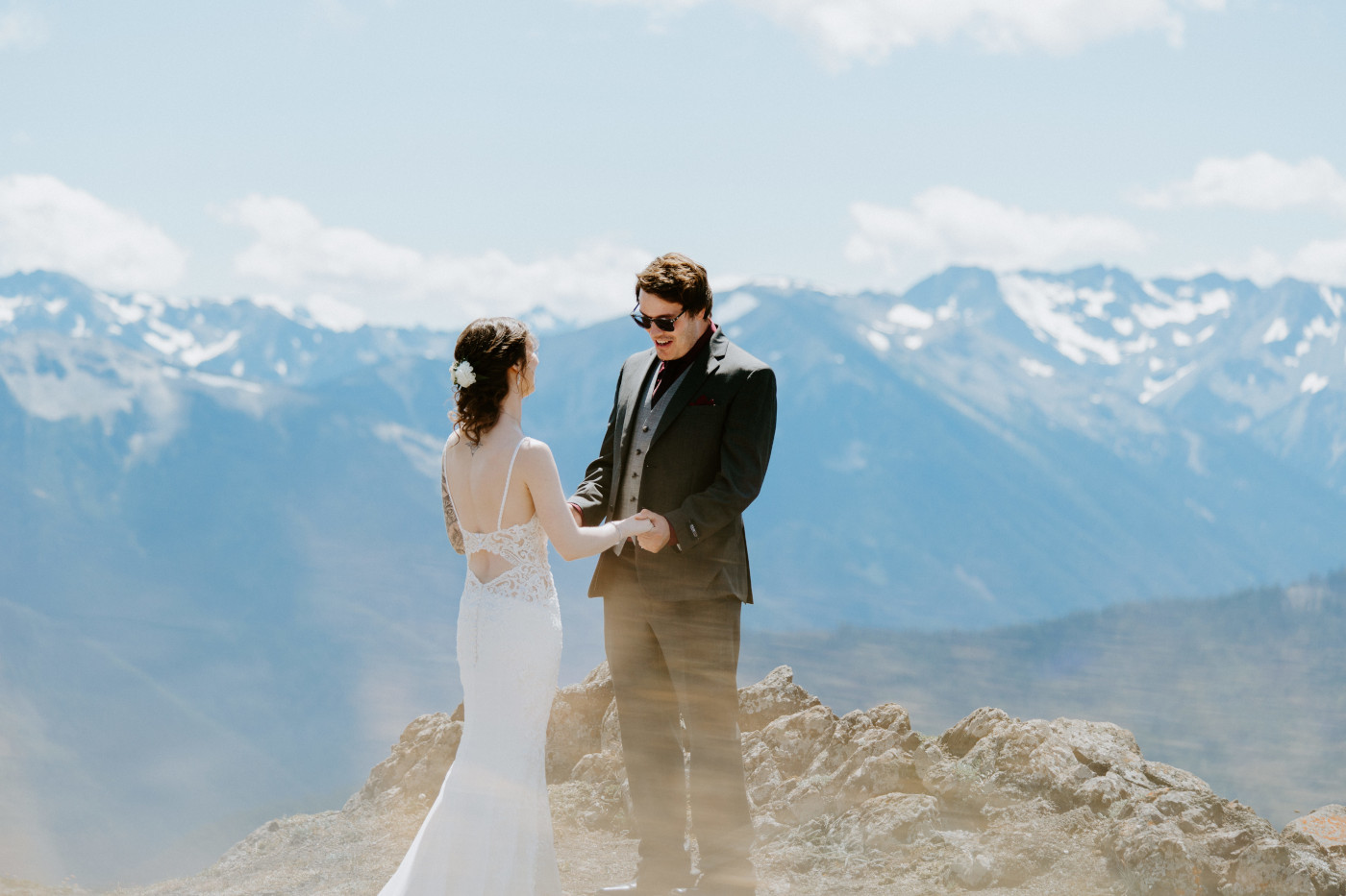Adrielle and Coty hold hands during their first look at Olympic National Park.