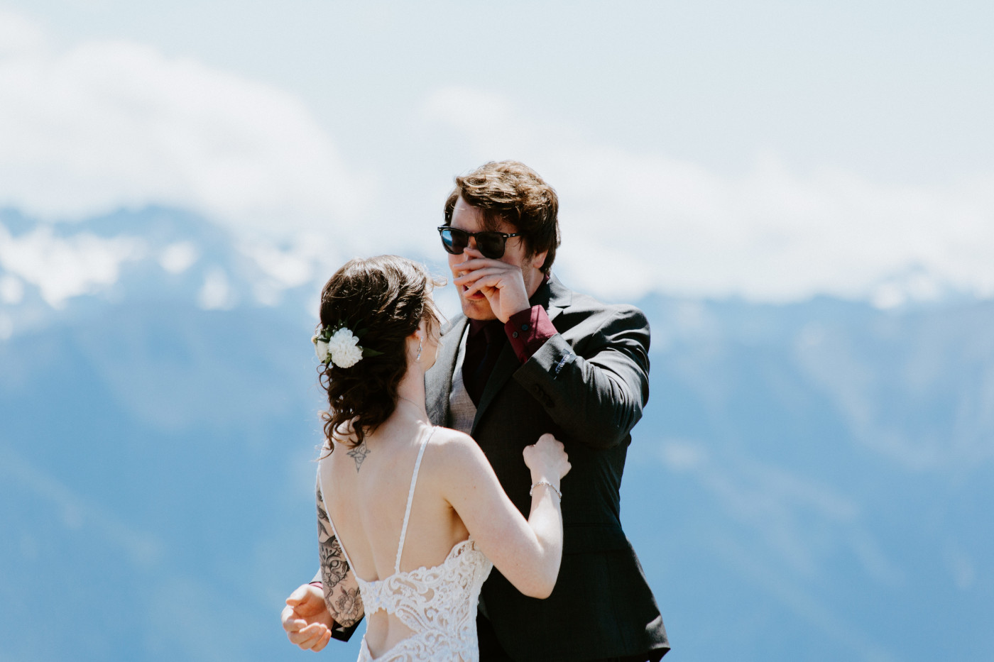 Coty wipes his eyes while seeing Adrielle for the first time at Olympic National Park.