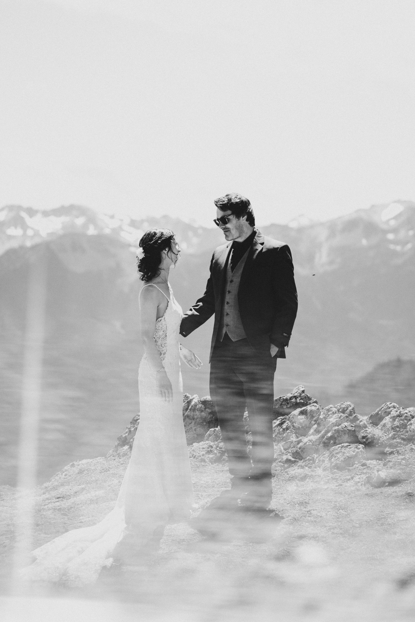 The bride and groom to be admire each other during a first look at Olympic National Park.