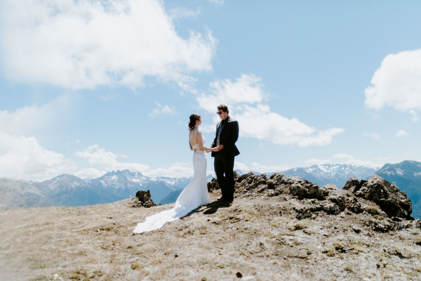 The bride and groom to be admire each other at Olympic National Park.