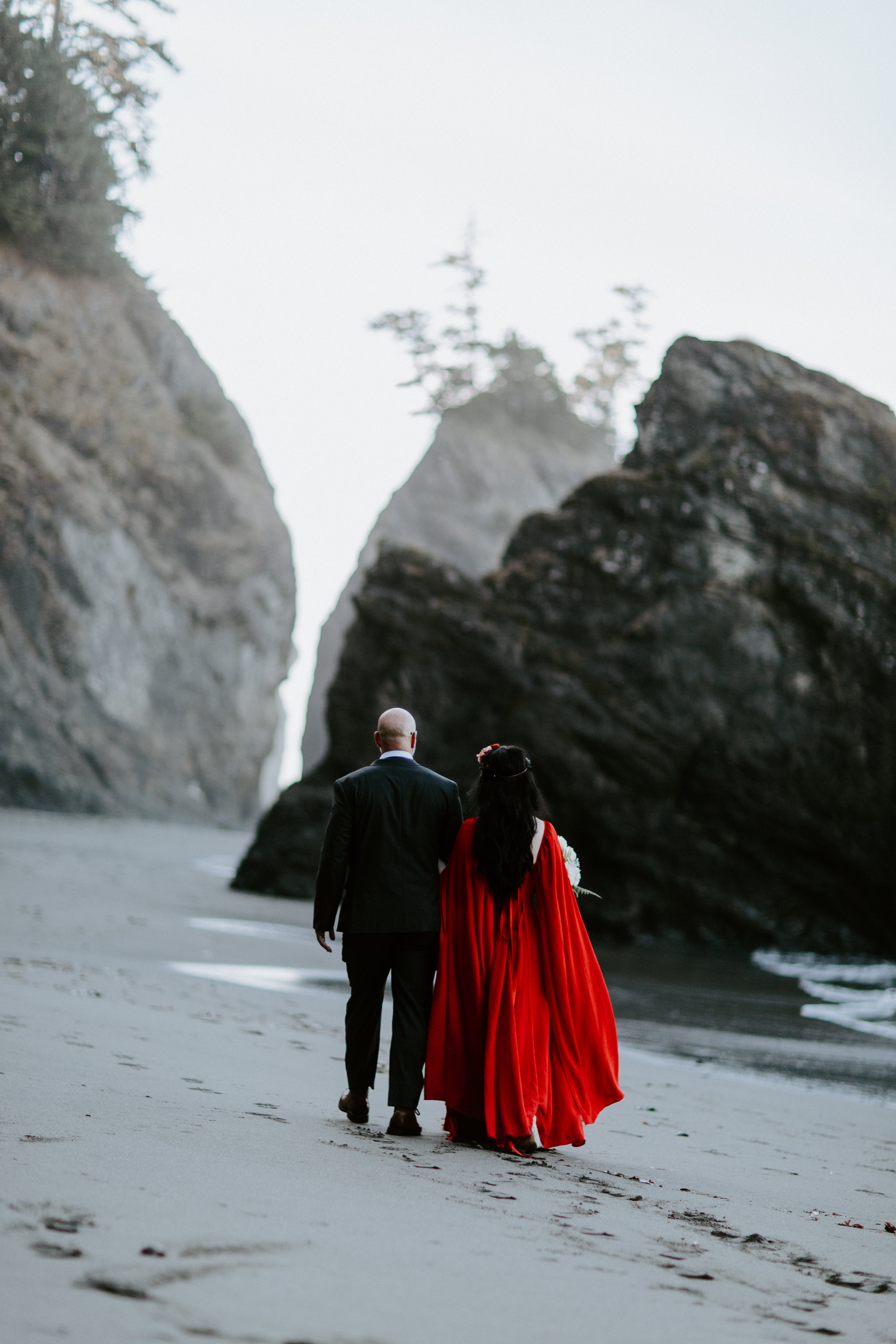 Rachael and Boyd walk on Secret Beach at Samuel H. Boardman in Oregon.
