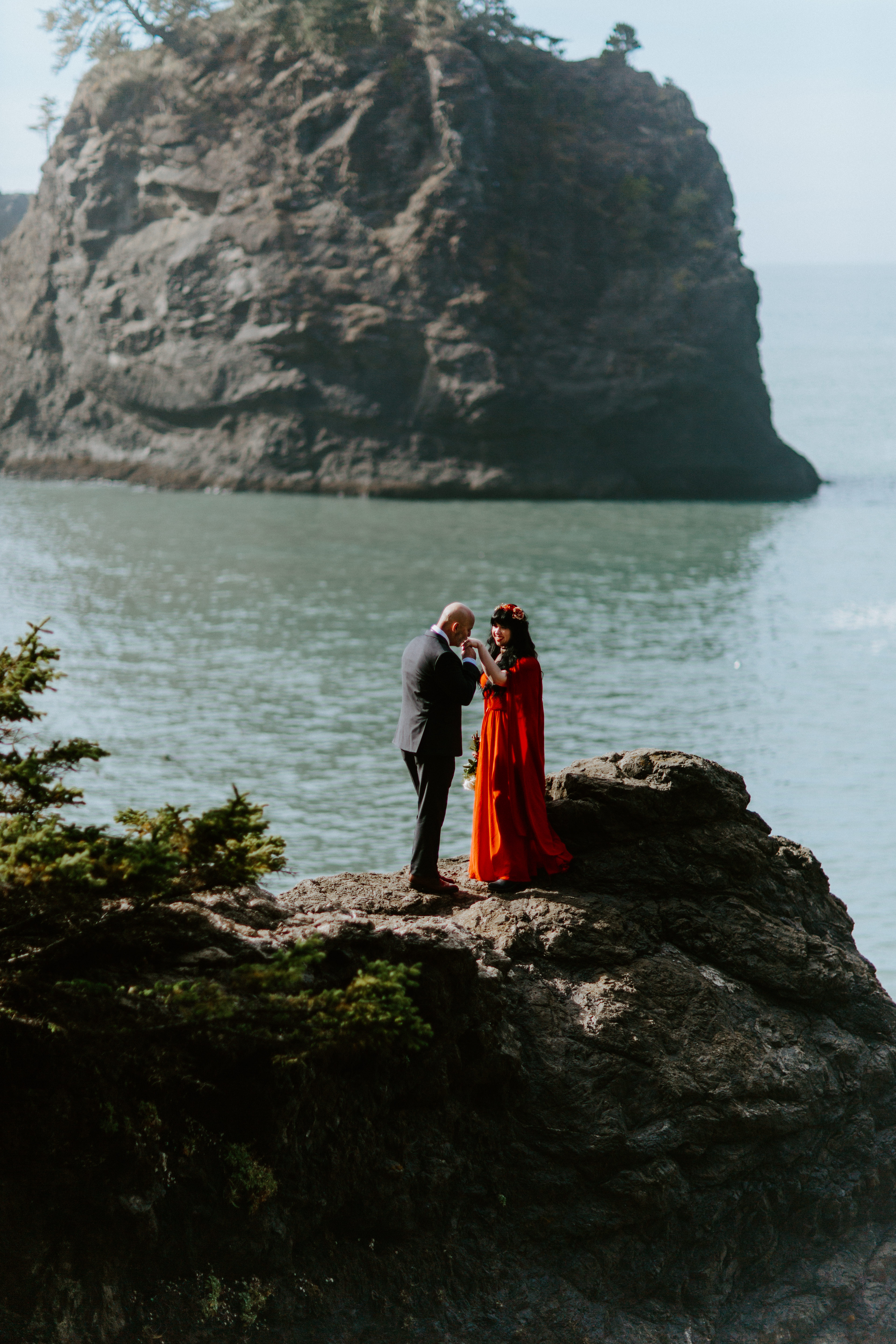 Boyd kisses Rachael's hand during their elopement at Samuel H. Boardman in Oregon.