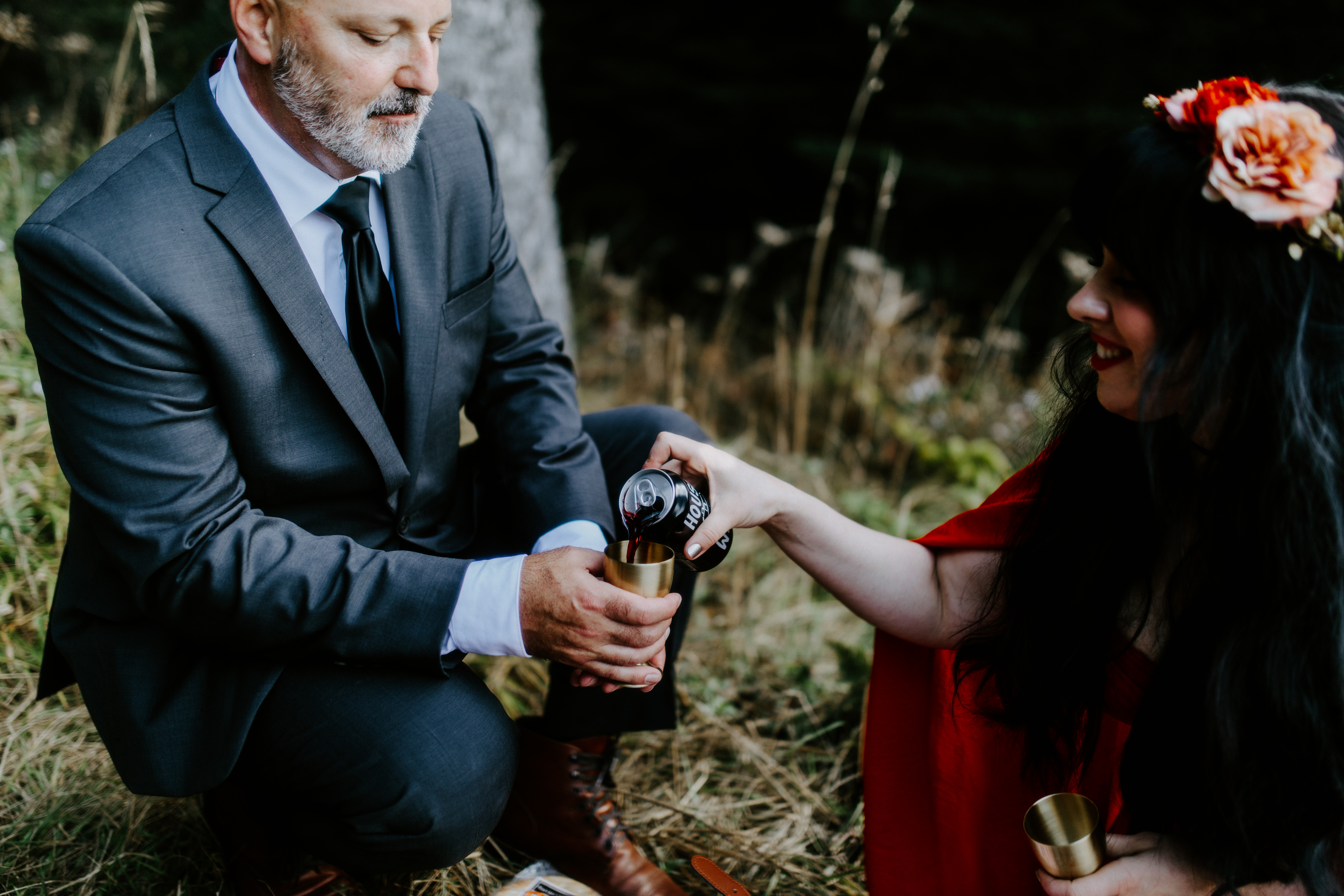 Rachael pours a drink for Boyd after their elopement ceremony at Samuel H. Boardman, Oregon.