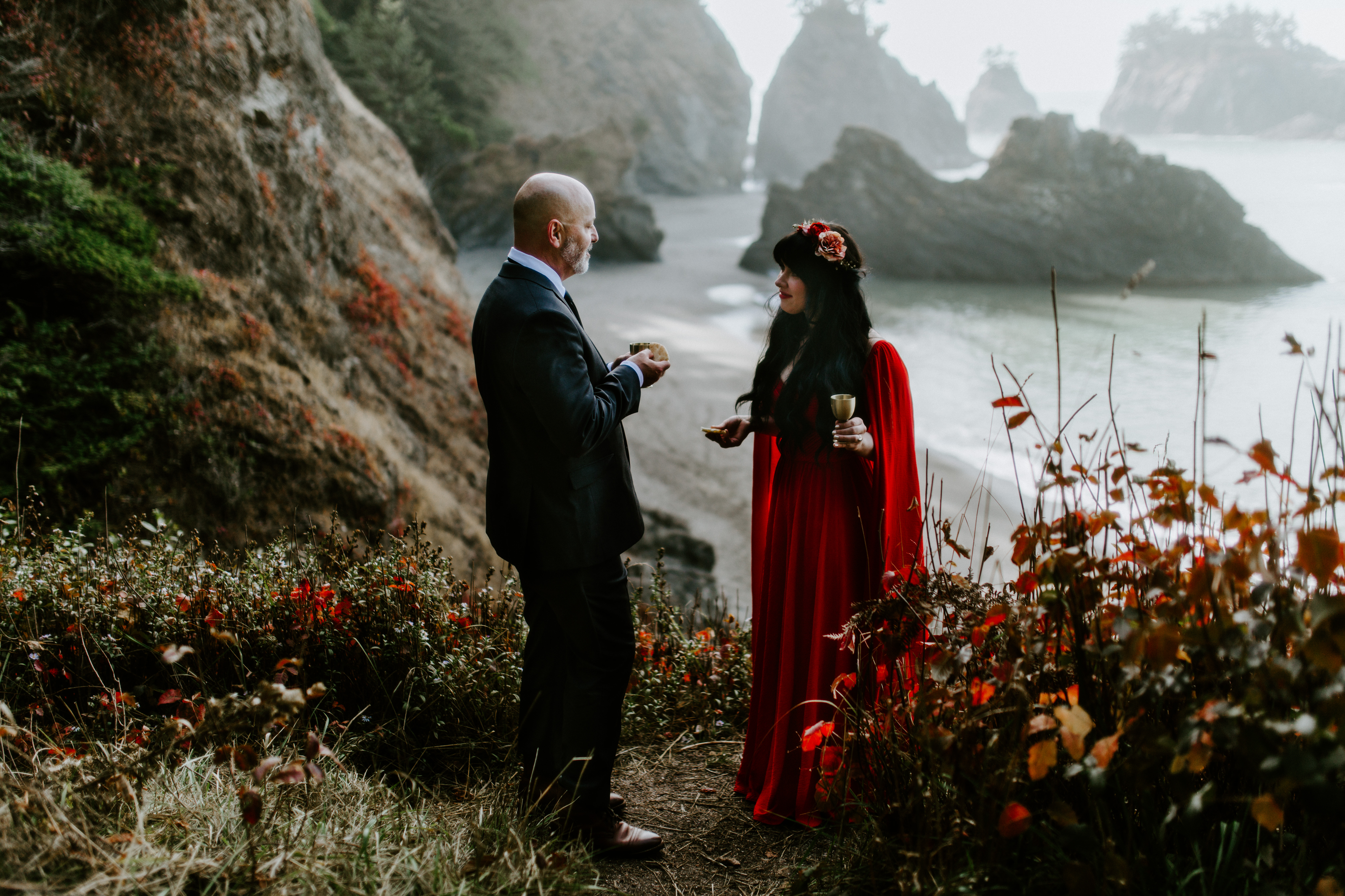 Rachael and Boyd stand near a cliff after their elopement in Samuel H. Boardman, Oregon.
