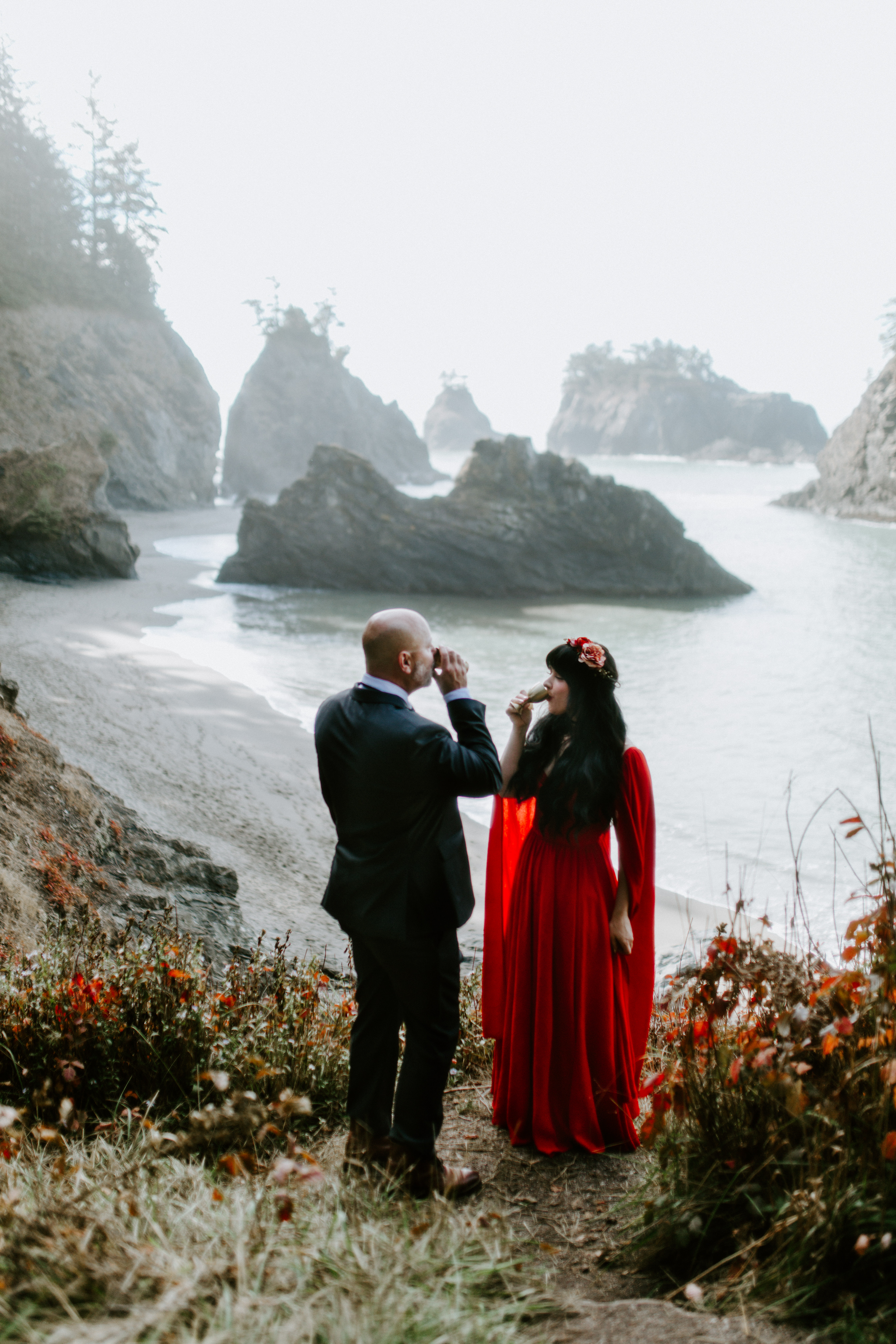 Boyd and Rachael share a drink after their elopement at the Samuel H. Boardman Scenic Corridor in Oregon.