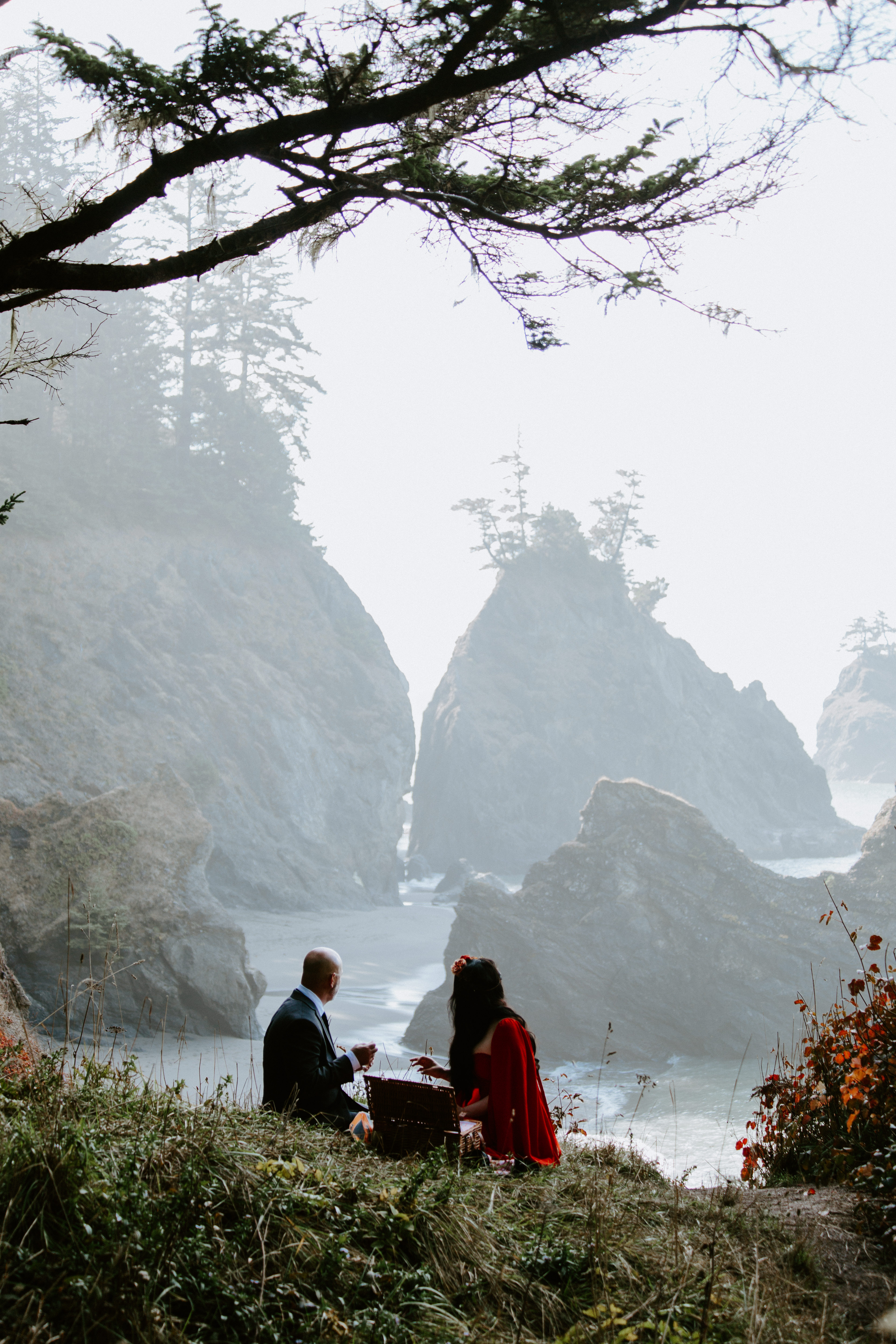 Boyd and Rachael look out onto the coast of Samuel H. Boardman after their elopement in Oregon.