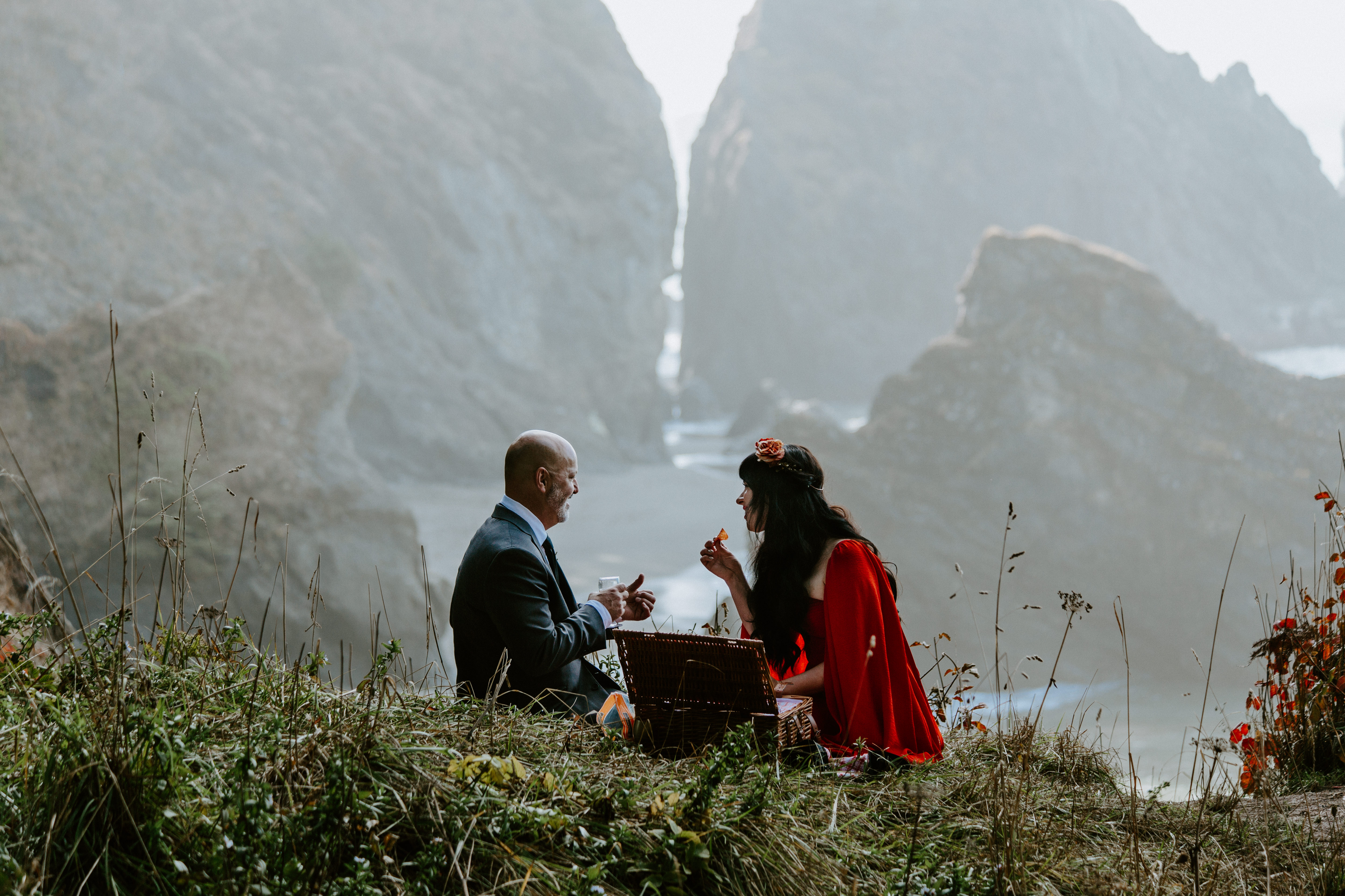 Rachael and Boyd share a snack after their elopement at Samuel H. Boardman in Oregon.